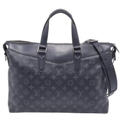 Portefeuille Explorer en toile Monogramme Eclipse de Louis Vuitton