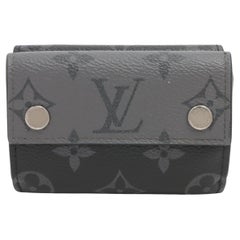 Louis Vuitton Monogramm Eclipse Discovery Kompaktes Portemonnaie mit Monogramm