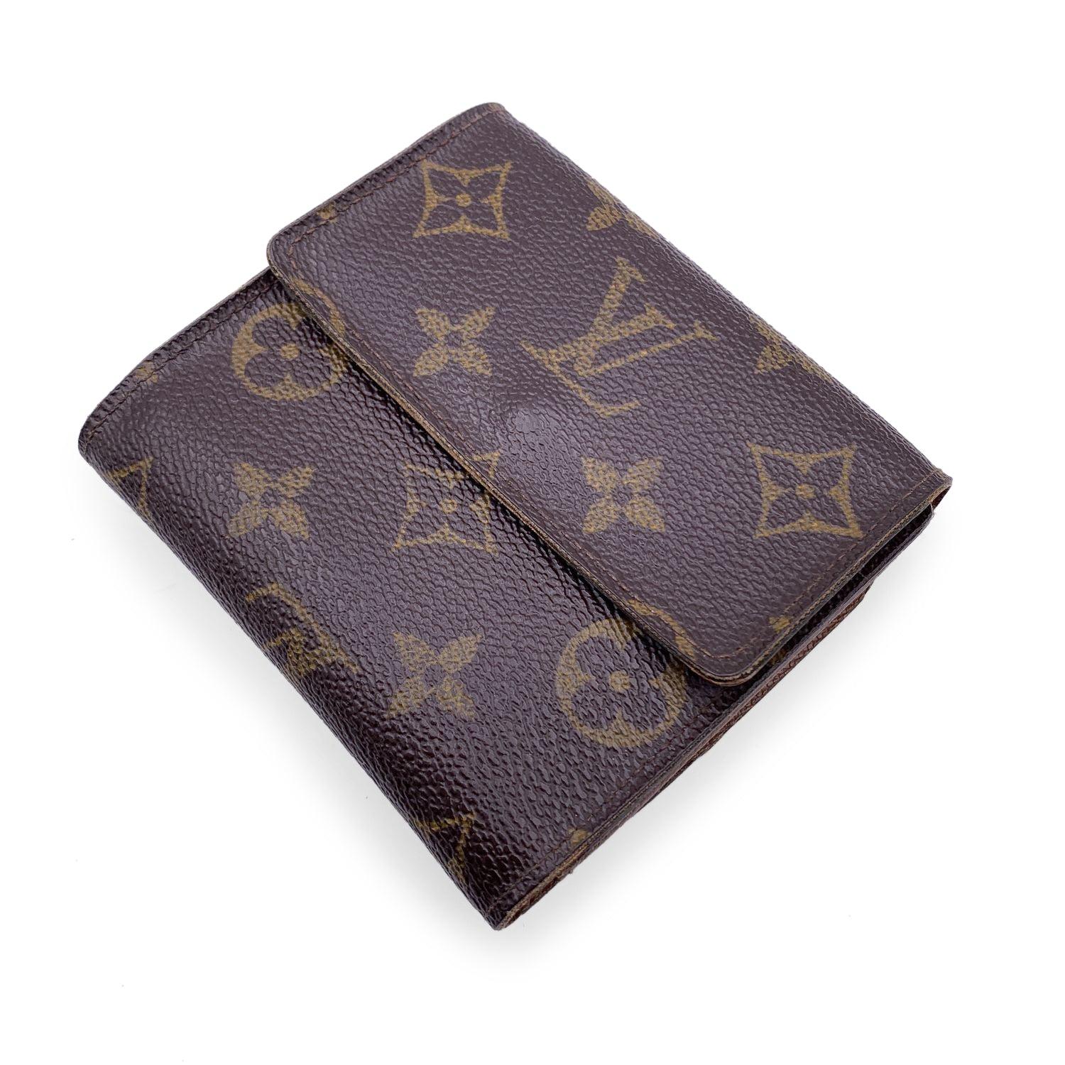 Louis Vuitton 'Elise' square-shaped wallet with double side flap, mode. M61654. Crafted in brown monogram canvas. Tan leather lining. 1 coin compartment on a side and a bifold section on the other side, with 1 bill compartment, 6 credit card slots