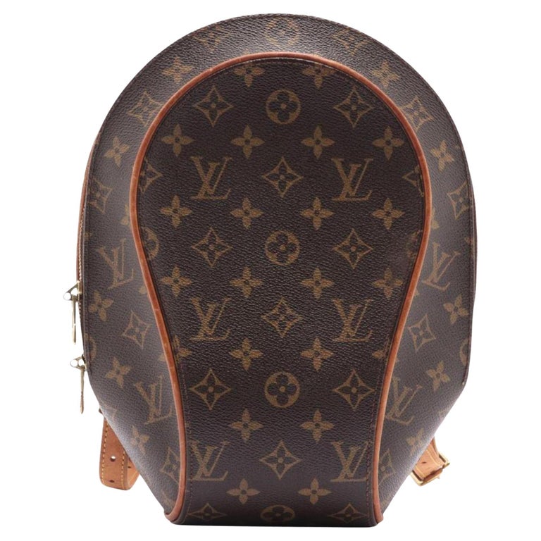 A 1996 Louis Vuitton Backpack with an attached umbrella is up for