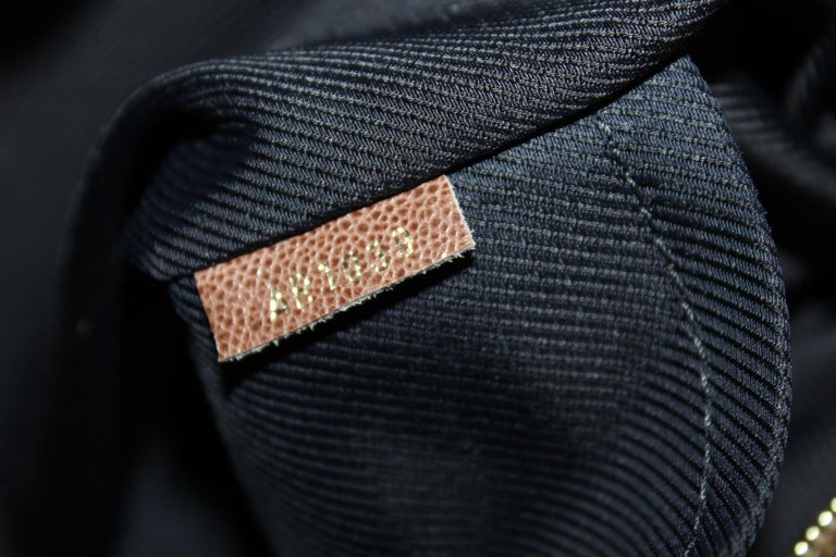 Louis Vuitton  Monogram Embossed Suede And Patent Irene Handbag For Sale 1