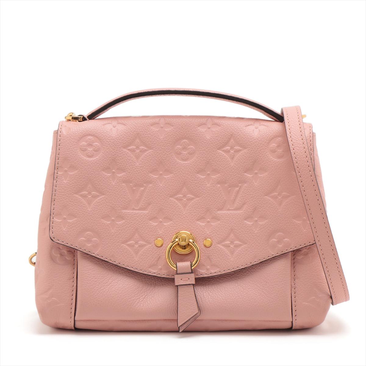 The Louis Vuitton Monogram Empreinte Blanche BB is a luxurious and sophisticated handbag that showcases the brand's iconic Monogram Empreinte leather, known for its supple texture and embossed monogram pattern. Meticulously crafted, the BB (Baby)