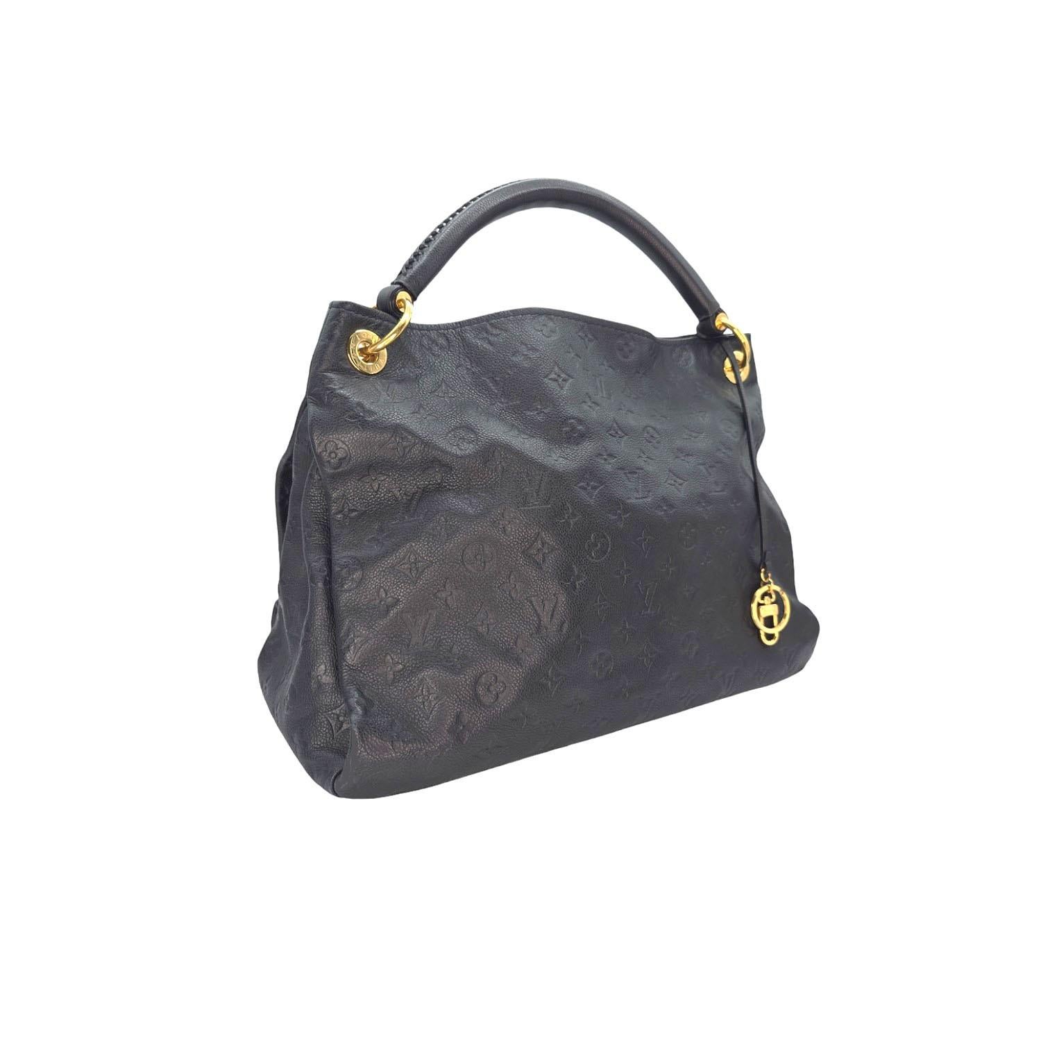 The Artsy handbag delights with its refined craftsmanship and functional features. Fashioned from supple Monogram Empreinte embossed leather, this quietly luxurious hobo features a handmade, cross-stitched handle that slips easily over the shoulder.