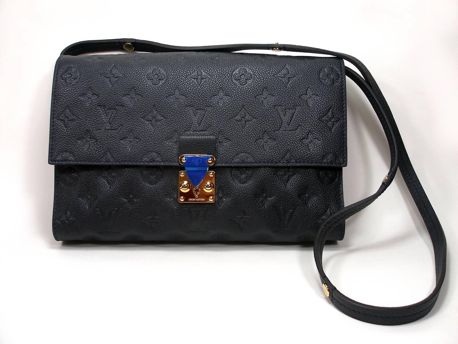 Empreinte Leather
Color : dark navy blue
Code date inside : TR3183
This bag is never worm
Please note : a little stain on the inside, which can't be seen ( look the picture of code date)
Measurements : 
Shoulder Strap : 58 cm in double 
Length :