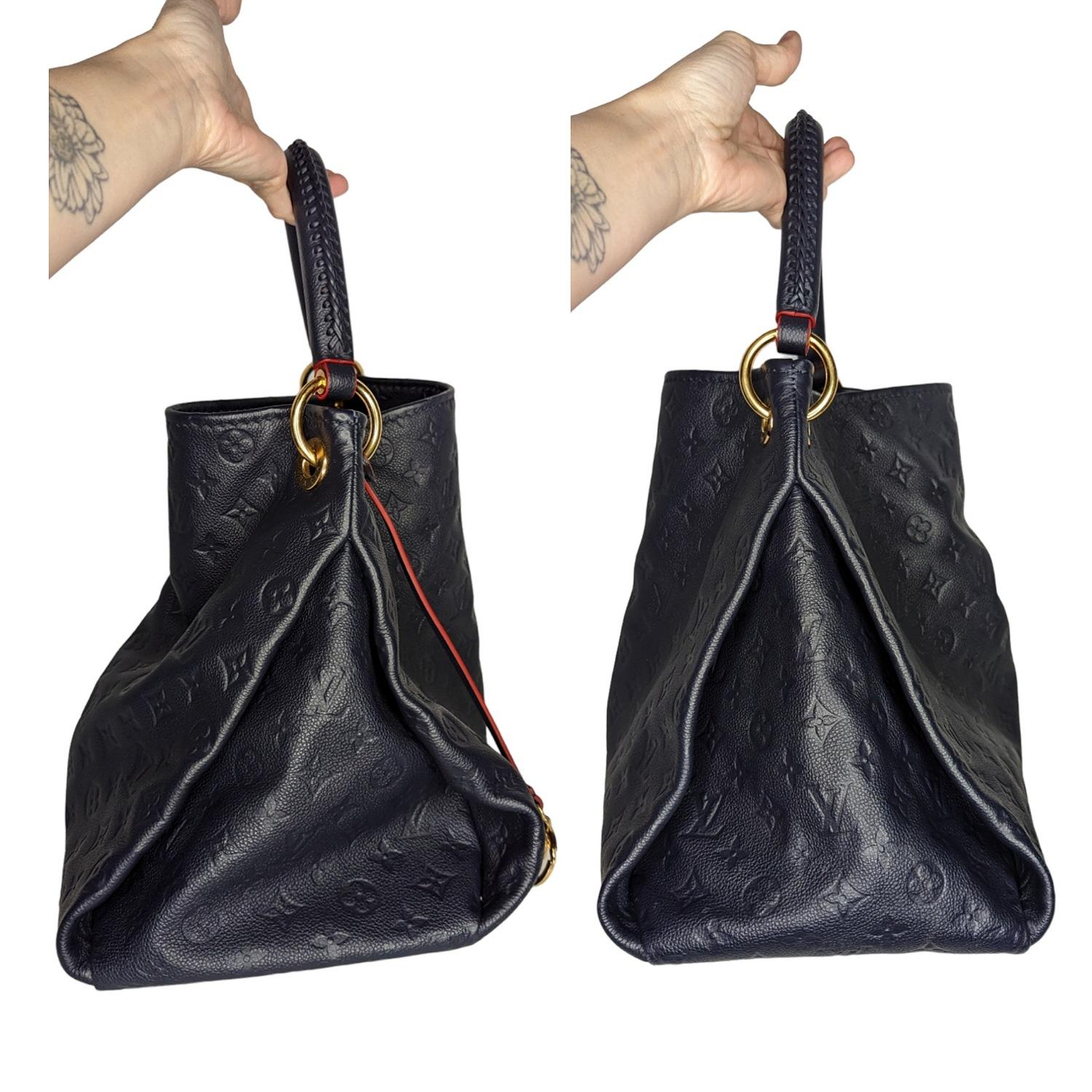 black louis vuitton bag with red interior