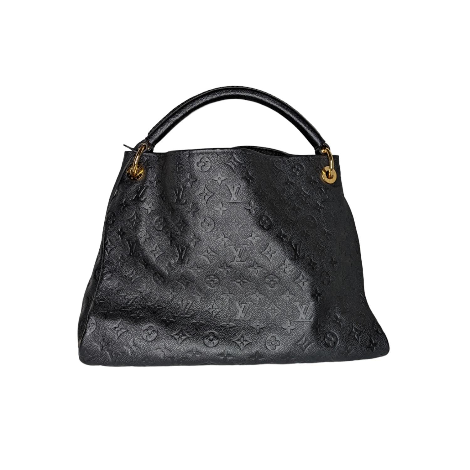 The Artsy handbag delights with its refined craftsmanship and functional features. Fashioned from supple Monogram Empreinte embossed leather, this quietly luxurious hobo features a handmade, cross-stitched handle that slips easily over the shoulder.