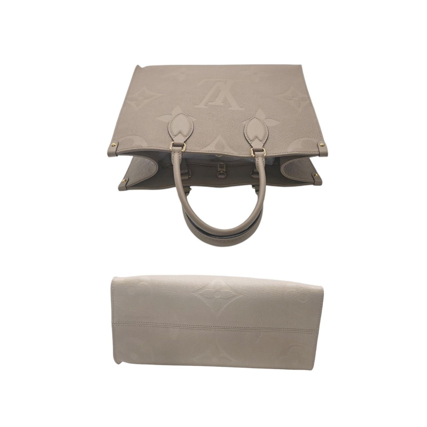 Sac cabas Onthego MM Empreinte en cuir monogrammé Louis Vuitton Excellent état - En vente à Scottsdale, AZ