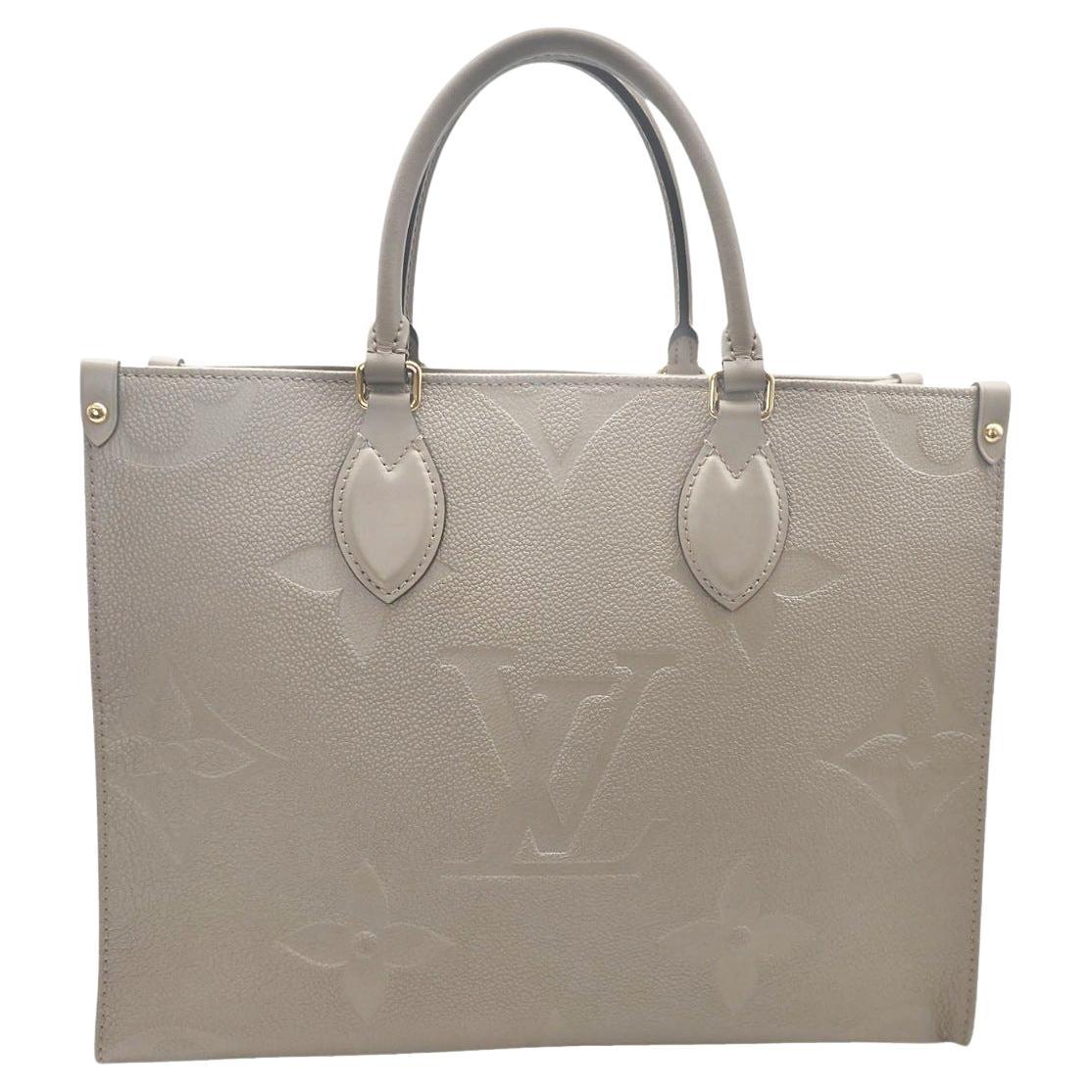 Louis Vuitton Monogram Empreinte Leather Onthego MM Tote