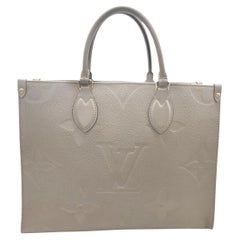 Louis Vuitton Monogram Empreinte Leather Onthego MM Tote