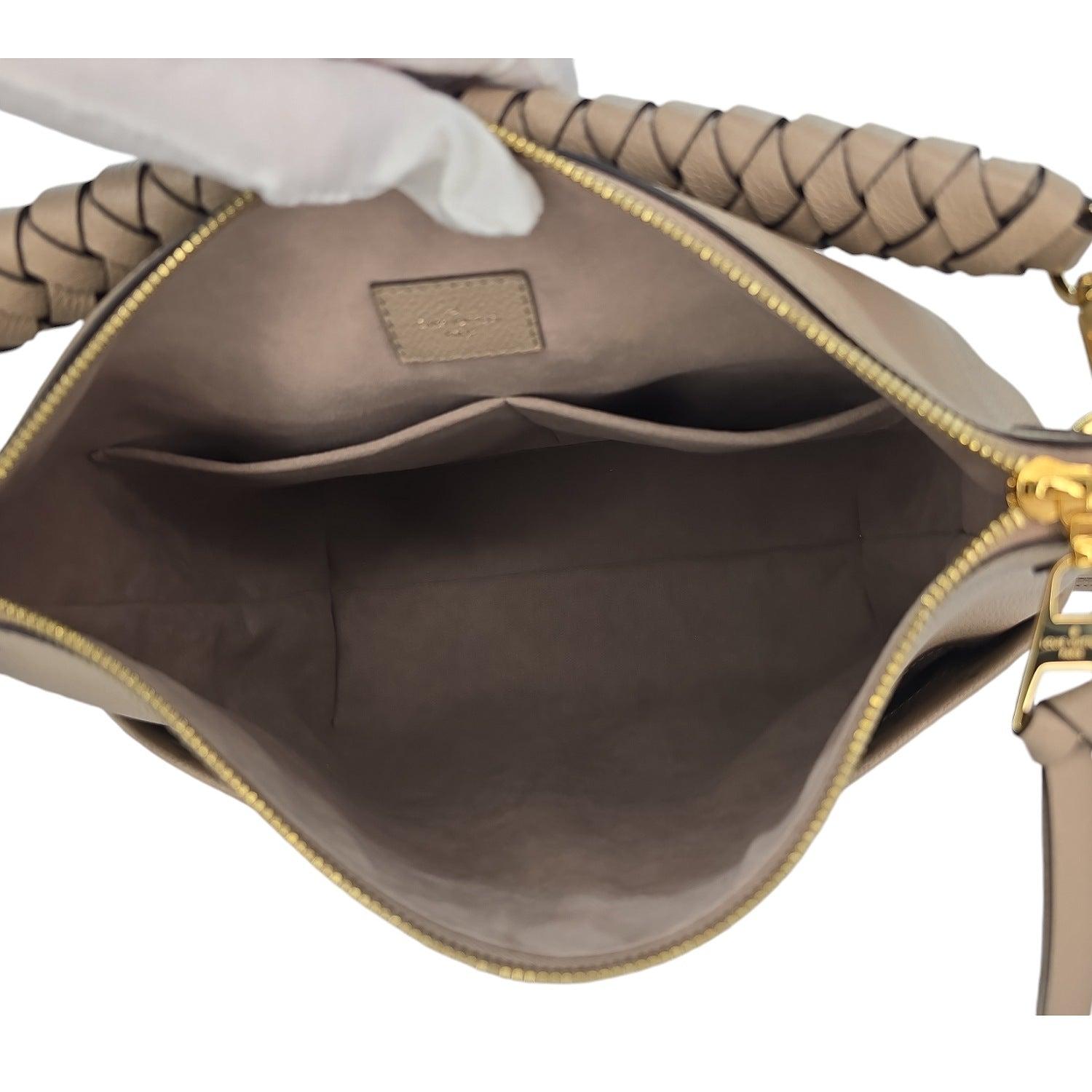 Women's Louis Vuitton Monogram Empreinte Maida Hobo
