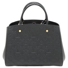 Louis Vuitton Monogram Empreinte Montaigne MM Schwarz
