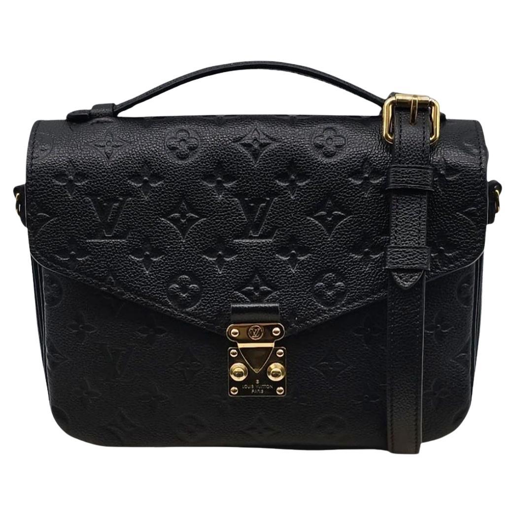 Exquisitely crafted from LV Monogram Embossed Leather, this authentic Louis Vuitton Pochette Metis showcases the brand's superior craftsmanship. The versatile design features an adjustable shoulder strap, convenient top handle, and secure S-lock