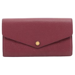 Louis Vuitton Monogram Empreinte Sarah Geldbörse Maroon