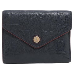 Louis Vuitton Empreinte Victorine Brieftasche Marine Rouge mit Monogramm Empreinte