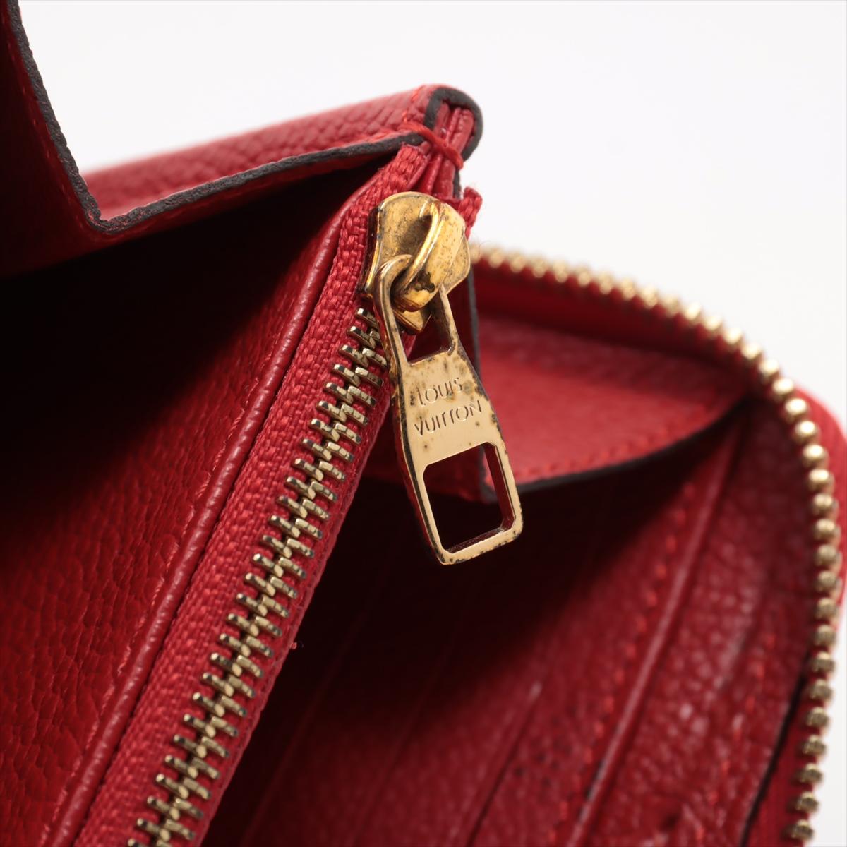 Louis Vuitton Portefeuille rouge Empreinte à fermeture Éclair Monogramme en vente 6