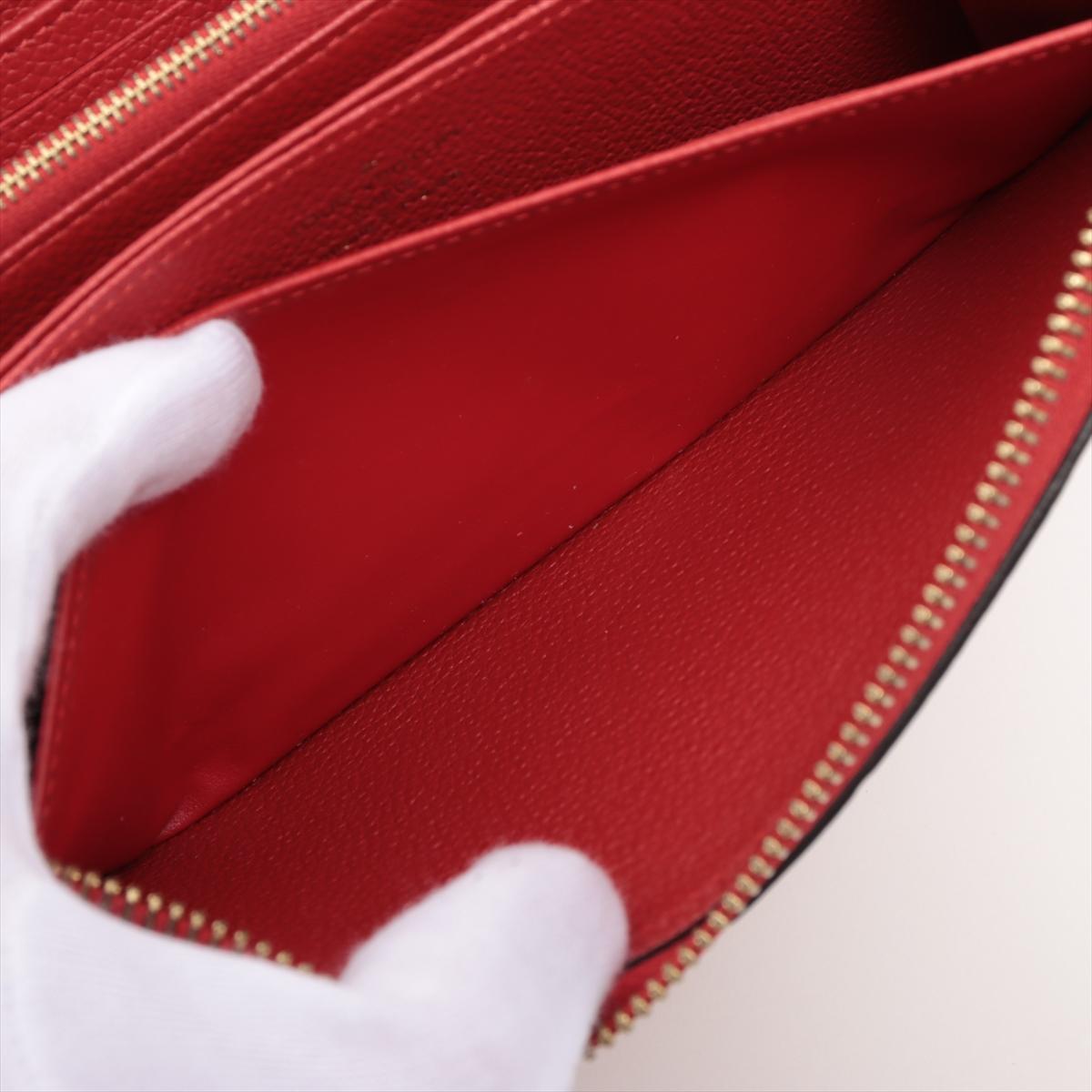 Louis Vuitton Portefeuille rouge Empreinte à fermeture Éclair Monogramme en vente 3