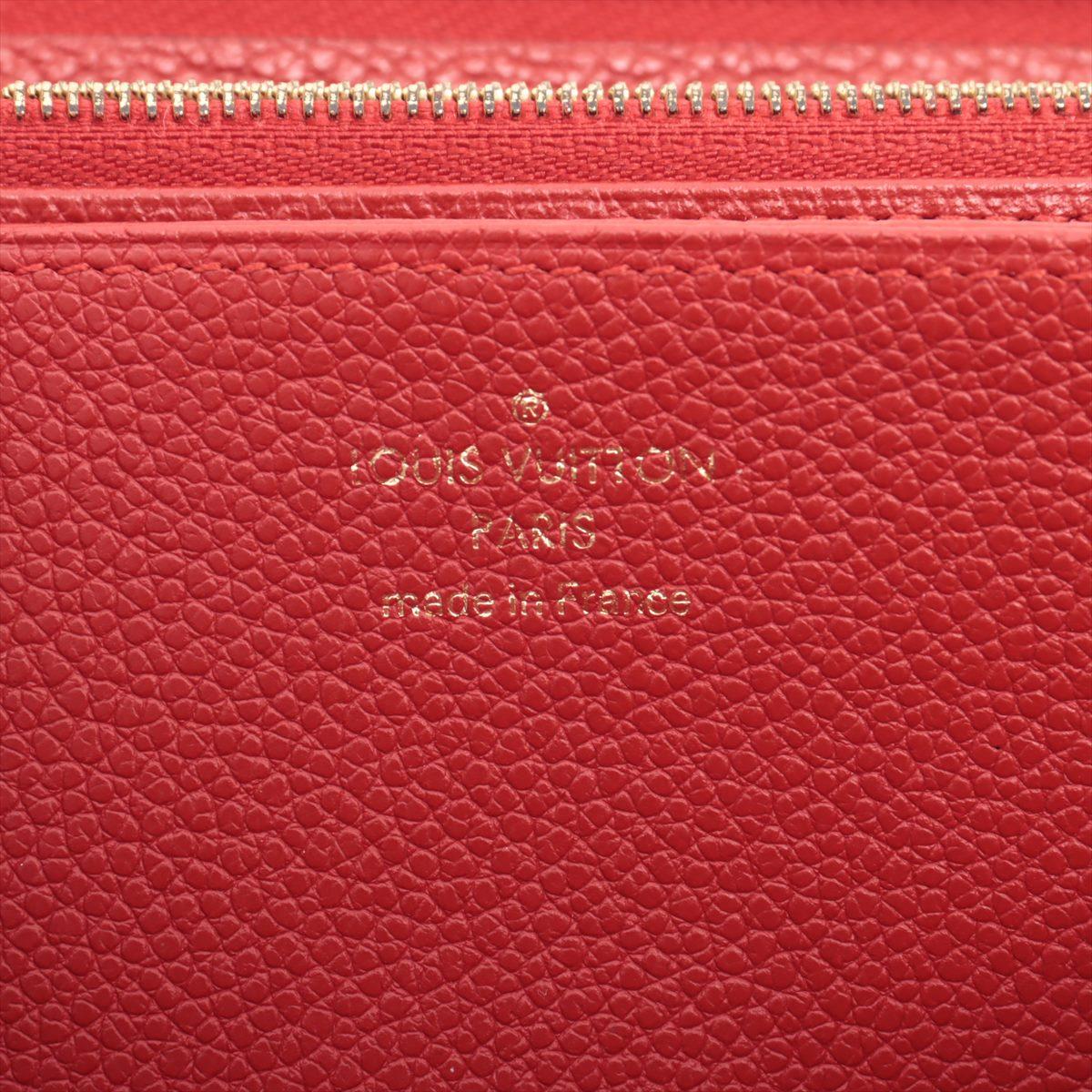 Louis Vuitton Portefeuille rouge Empreinte à fermeture Éclair Monogramme en vente 5