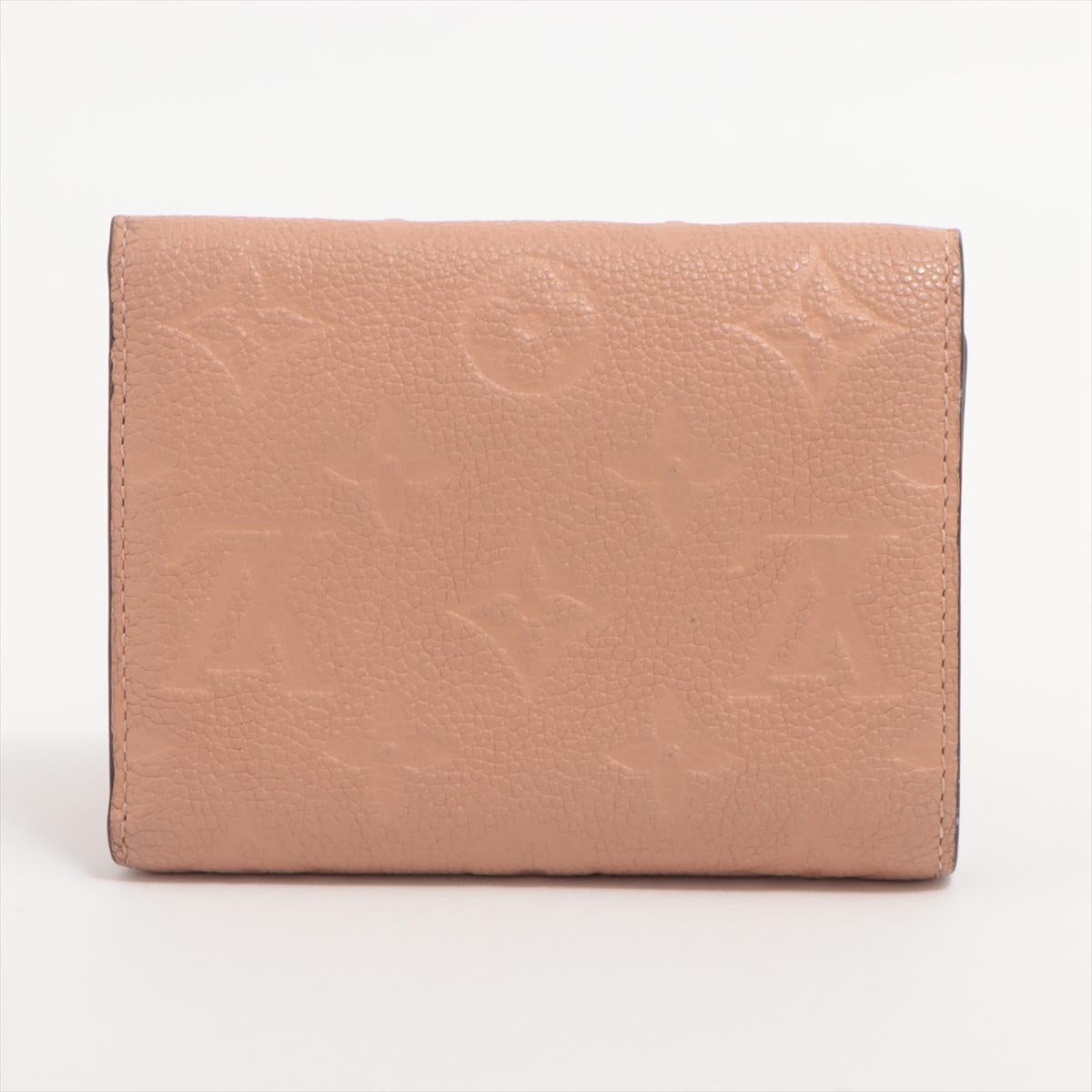 Louis Vuitton Monogram Empreinte Zoé Wallet Pink Beige In Good Condition For Sale In Indianapolis, IN
