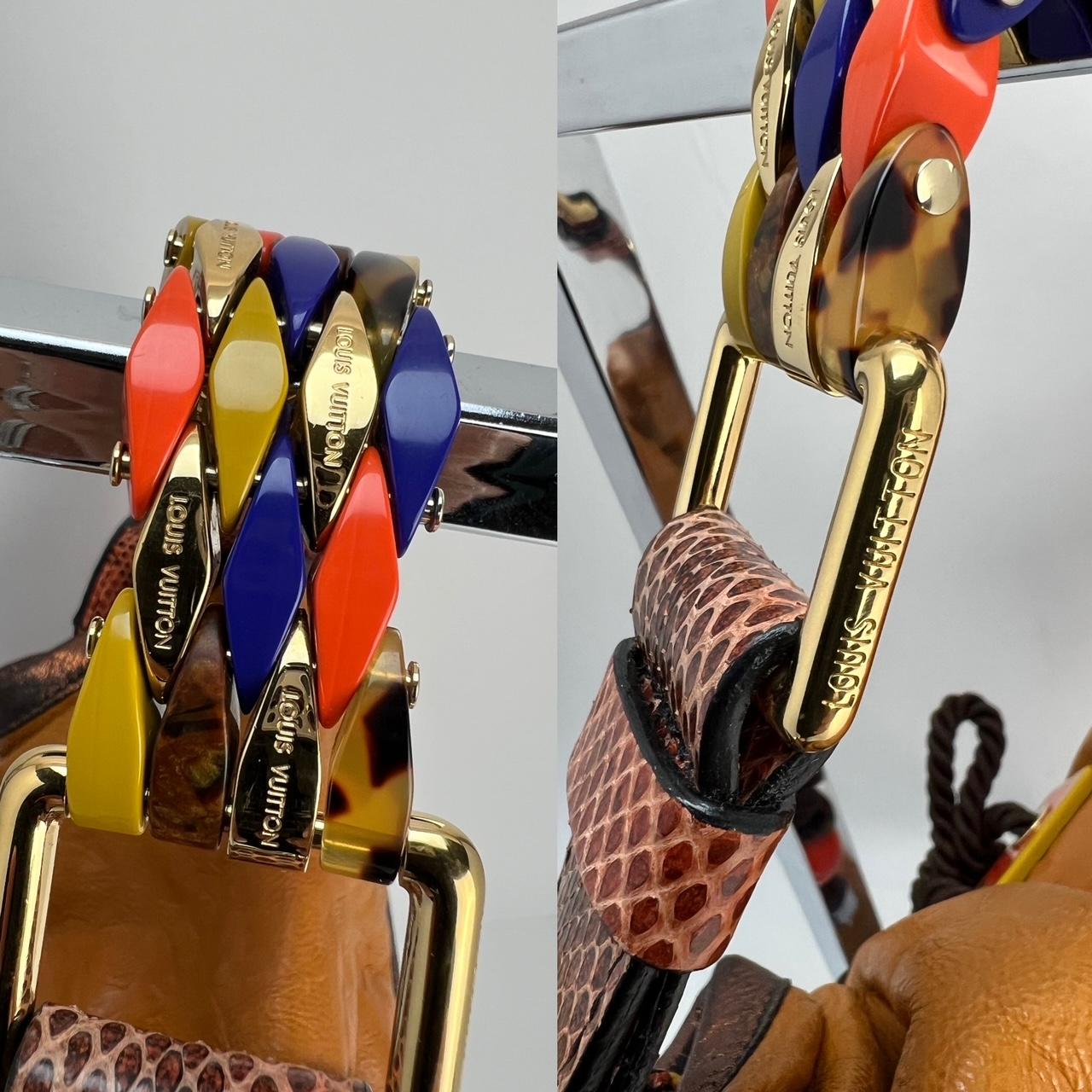 Pre-Owned  100% Authentic
LOUIS VUITTON Monogram Epices Kalahari PM yellow Shoulder Bag
Snakeskin Trim 
RATING: B...Very Good, well maintained, 
shows minor signs of wear, front has faint color difference
when flap open and you really look