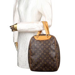 LOUIS VUITTON Monogram Excursion Shoe Bag