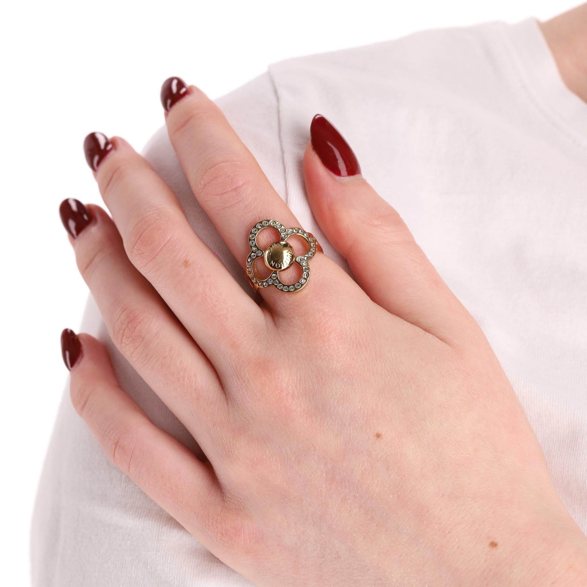 Louis Vuitton Monogram Flower Power Crystal Ring

Gold tone brass, chain-loop designed shank with signature LV monogram flower shaped setting.

Crystal trimmed petals and gold centre with 'Louis Vuitton' engravement.

Rrp Approx. £500

Size – L -