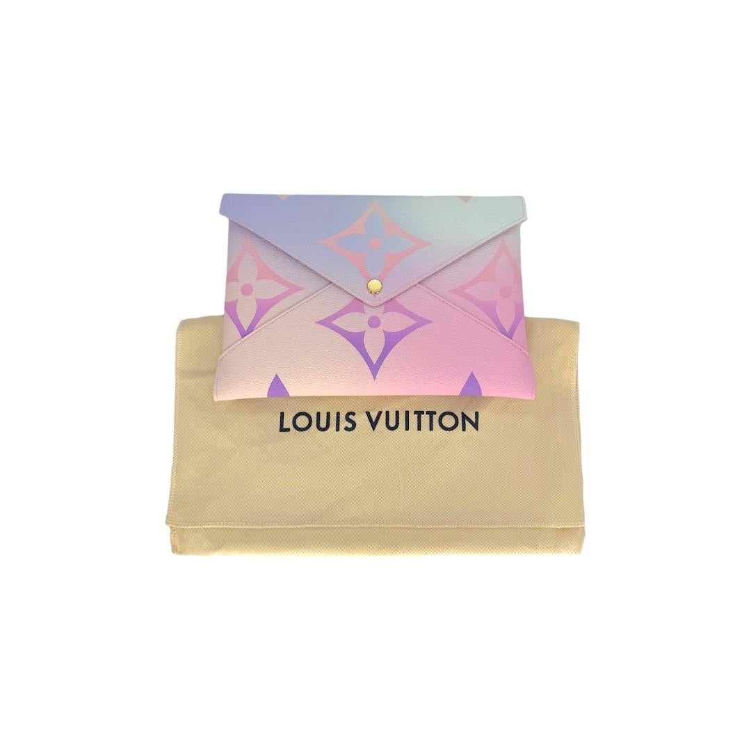 This Louis Vuitton Spring In the City Kirigami GM is from the Spring/Summer 2022 Collection and it is finely crafted of a multicolor Louis Vuitton Monogram Giant coated canvas and gold-tone hardware. It has a fold over press-stud closure that opens