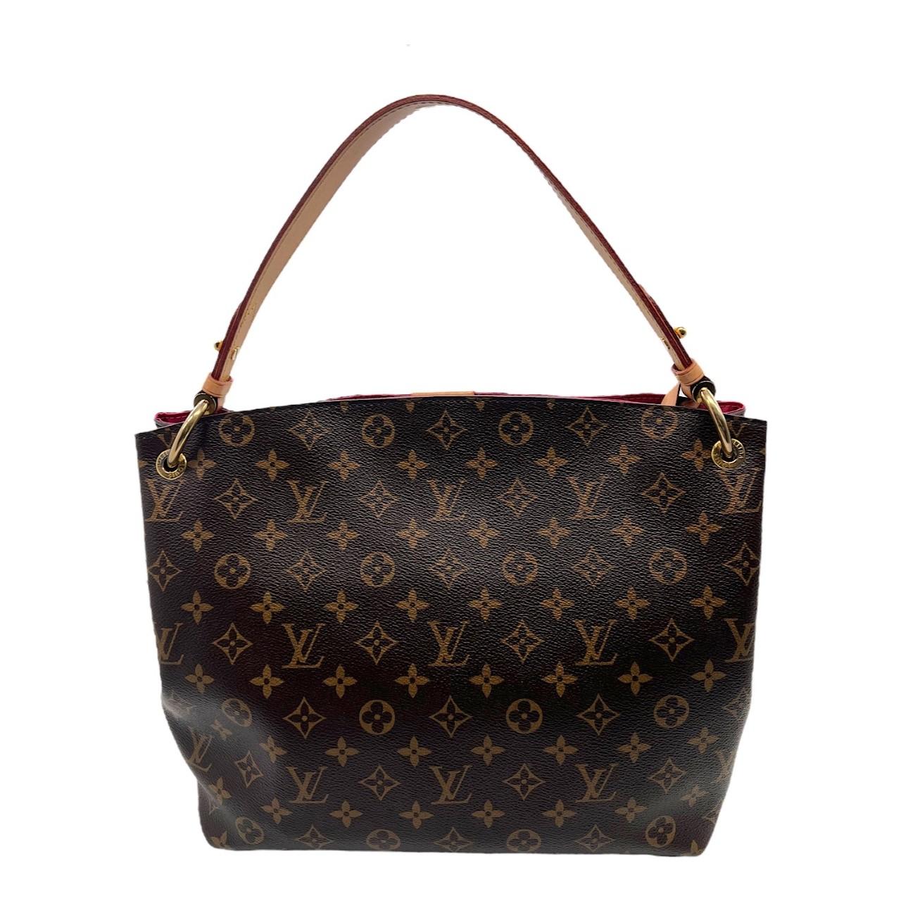 We are offering this beautiful Louis Vuitton Monogram Graceful PM It is crafted of the classic Louis Vuitton Monogram coated canvas exterior, with a flat leather shoulder handle with brass hardware. It features an open top magnetic leather patch