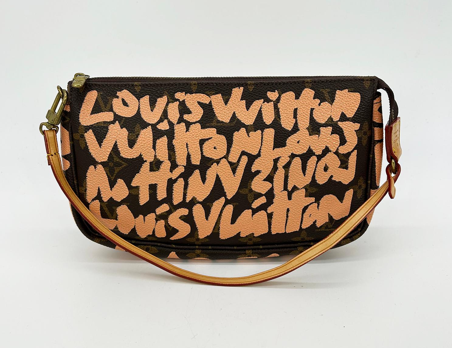 Louis Vuitton Monogram Graffiti Pochette Acessories in very good condition. Signature  Louis Vuitton monogram canvas exterior in brown and gold print with limited edition peach orange graffiti print throughout. Tan leather and golden brass hardware