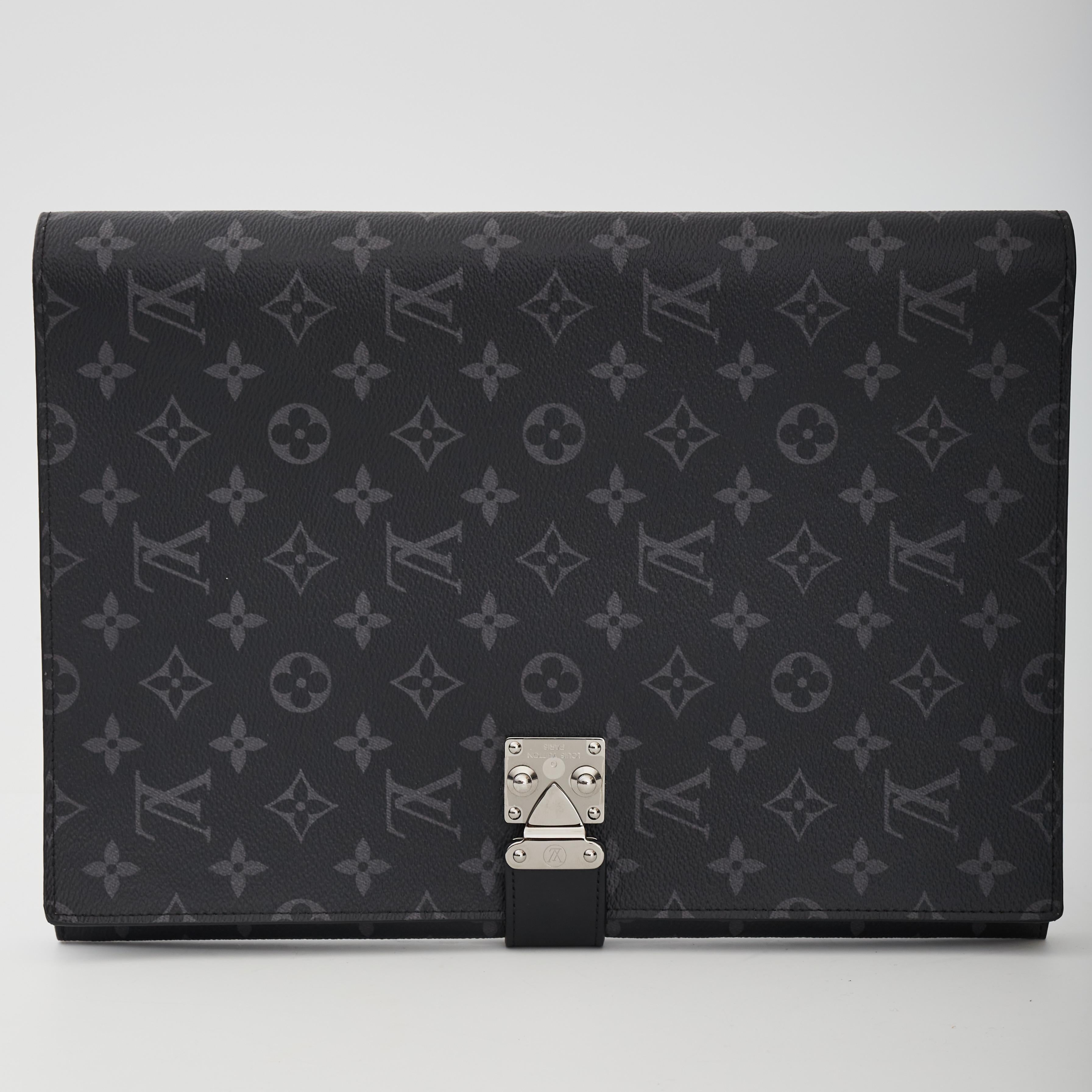 Louis vuitton portfolio. From the 2018 collection. Black coated canvas. Damier graphite pattern Silver-tone hardware. Leather lining & single interior pocket. Push-lock closure at front.

COLOR: Black
MATERIAL: Coated canvas with leather
DATE CODE: