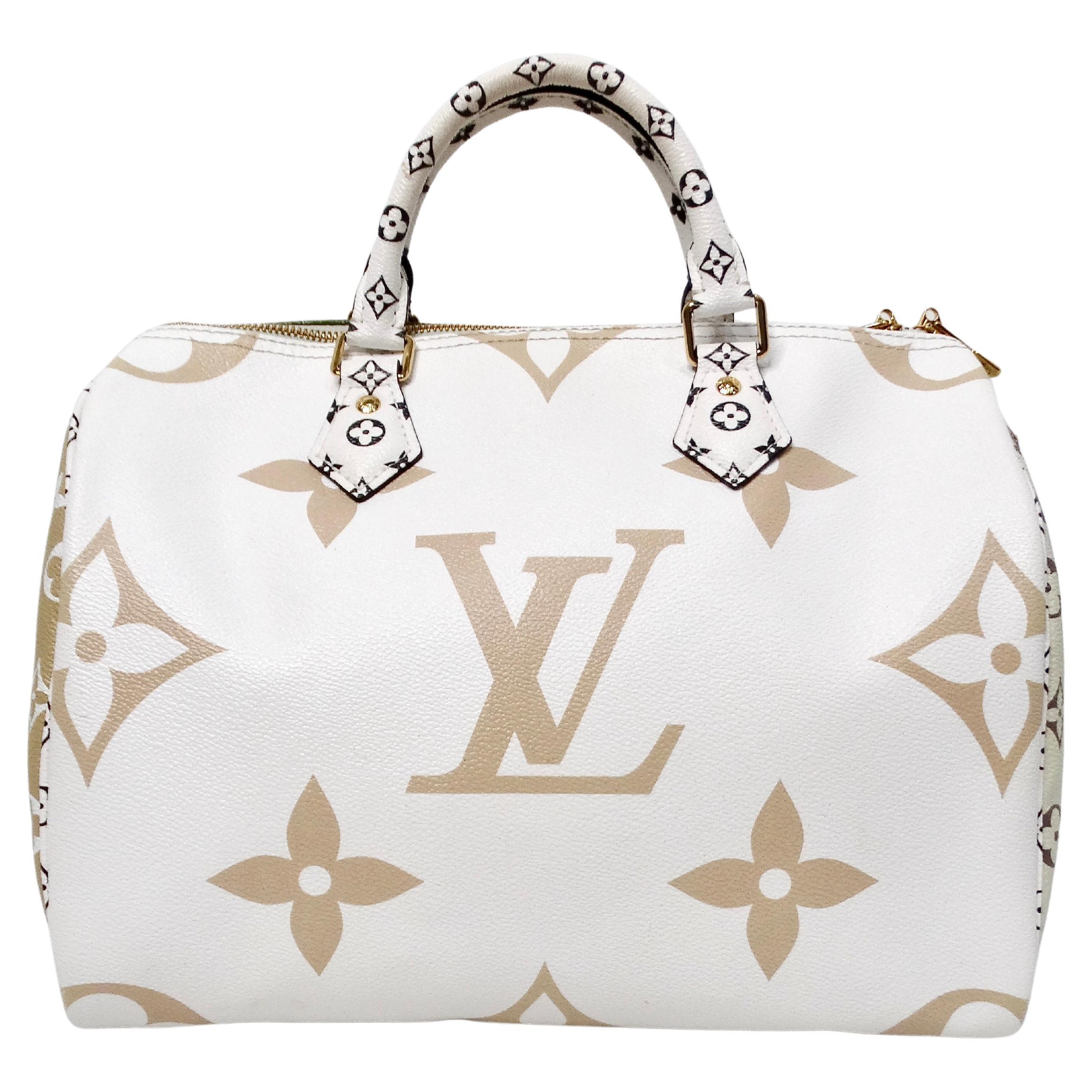The Louis Vuitton Monogram Green & White Bondouliere Speedy Tote Bag is a striking and versatile accessory that seamlessly combines classic luxury with contemporary style. One side of the bag features a sophisticated olive green hue, while the