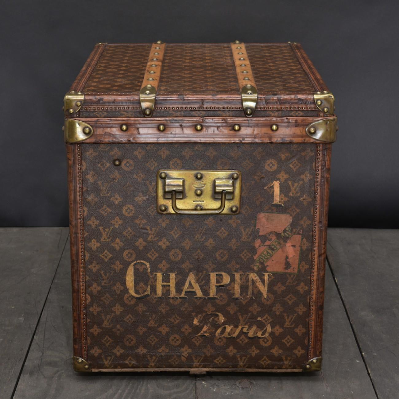 A stunning Louis Vuitton hat cube with LV monogram canvas, leather trim, brass handles, original lining and tray, circa 1905.

Dimensions: 61 cm/24 inches (length) x 46 cm/18? inches (width) x 54 cm/ 21¼ inches (height).

Bentleys are Members of