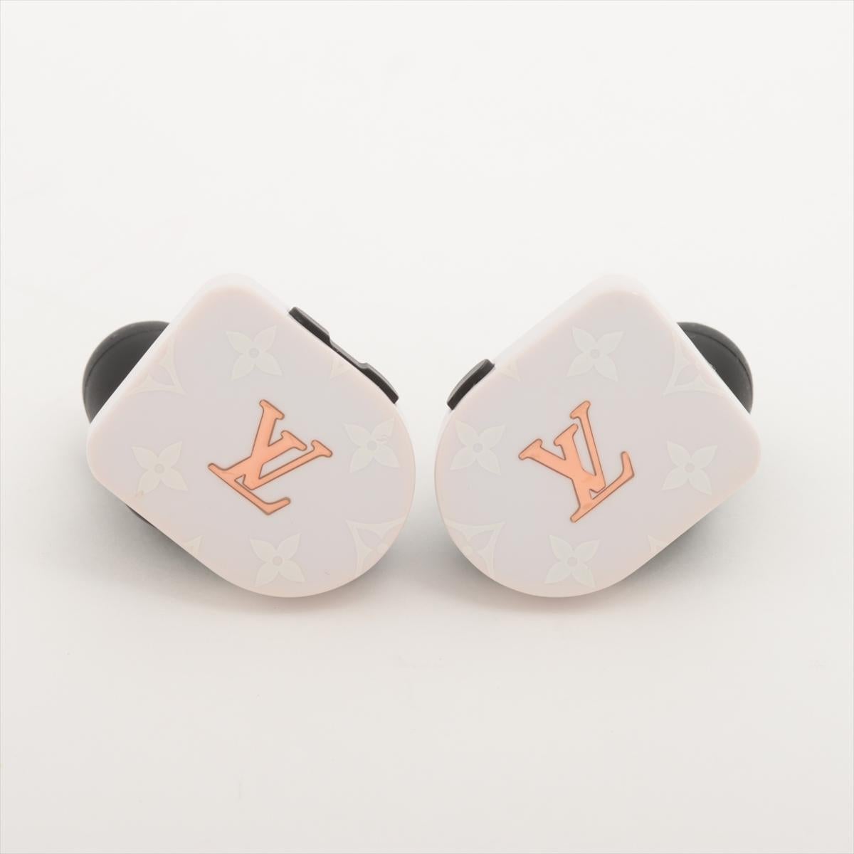 The Louis Vuitton Monogram Horizon Earphones in White combine cutting-edge technology with luxurious design. Featuring the iconic Louis Vuitton Monogram pattern on their sleek, white finish with pink accents, the wireless earphones offer exceptional