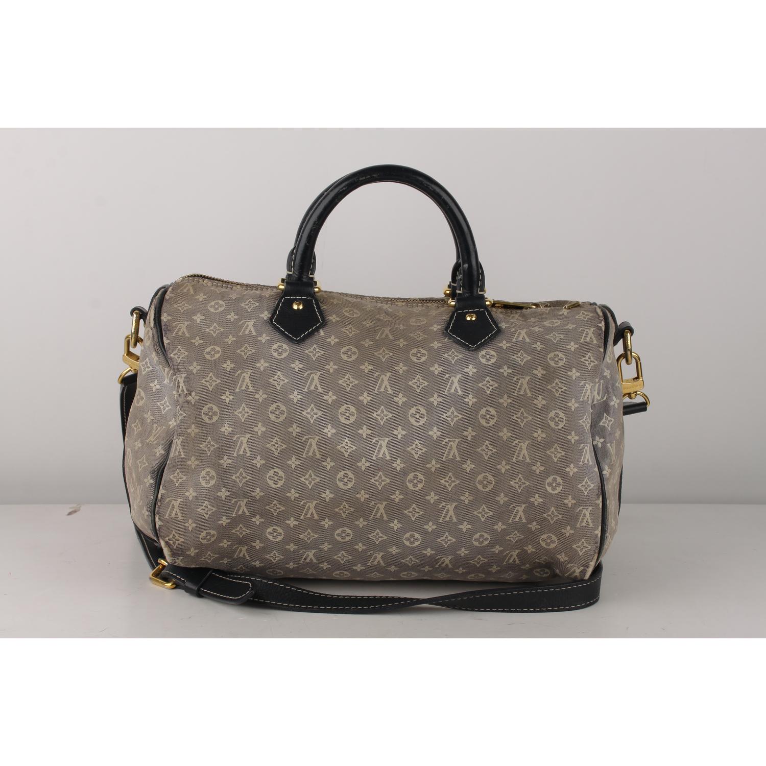 Louis Vuitton Monogram Idylle Encre Speedy 30 Bandouliere Bag

Material: Canvas
Color: Blue
Model: Speedy 30 Bandouliere
Gender: Women
Country of Manufacture: France
Size: Medium
Bag Depth: 7 inches - 17,8 cm 
Bag Height: 8 inches - 20,3 cm 
Bag