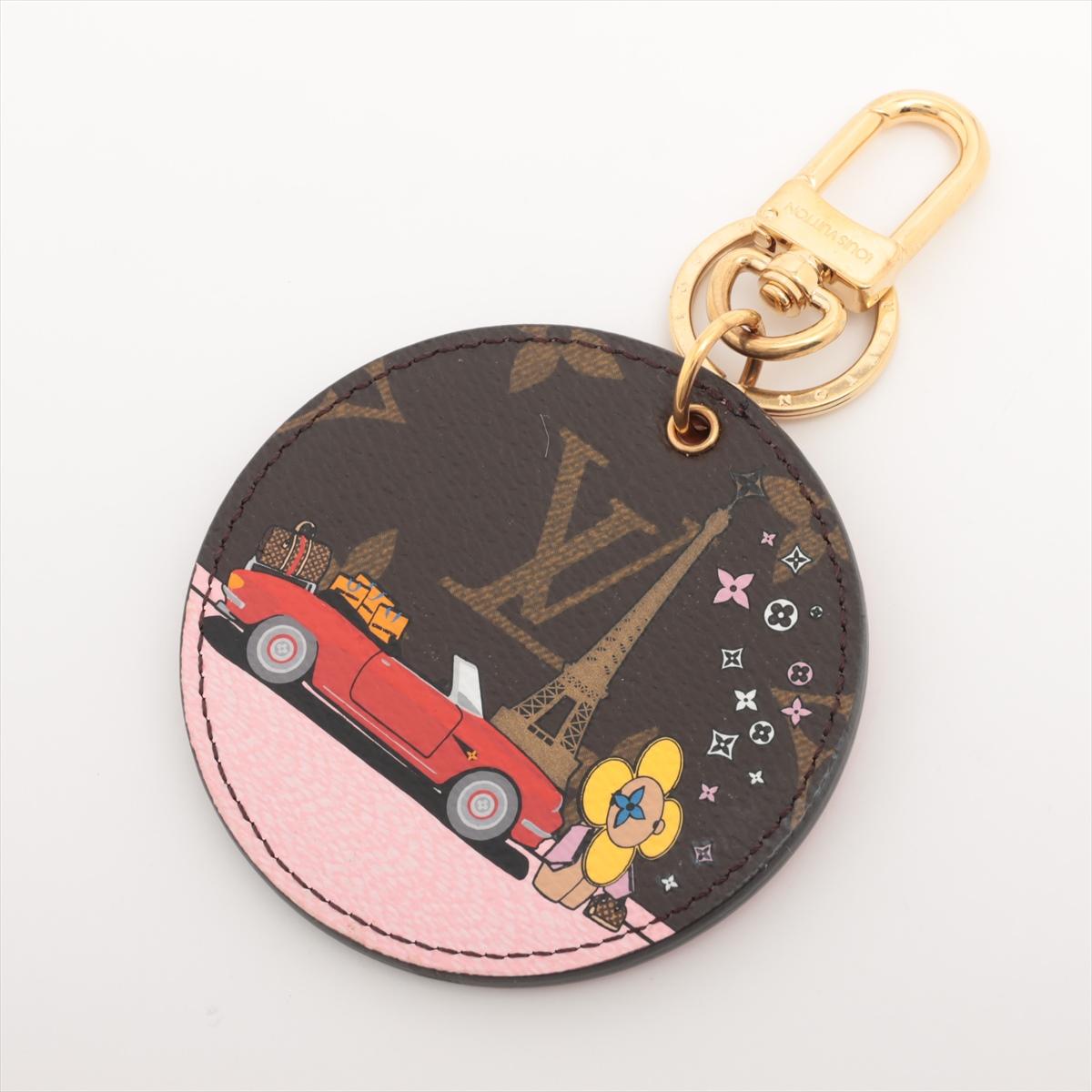 The Louis Vuitton Monogram Illustre Vivienne Paris Bag Charm in a round shape is a delightful and whimsical accessory that adds a touch of Parisian flair to any Louis Vuitton bag. Crafted with meticulous attention to detail, the bag charm features