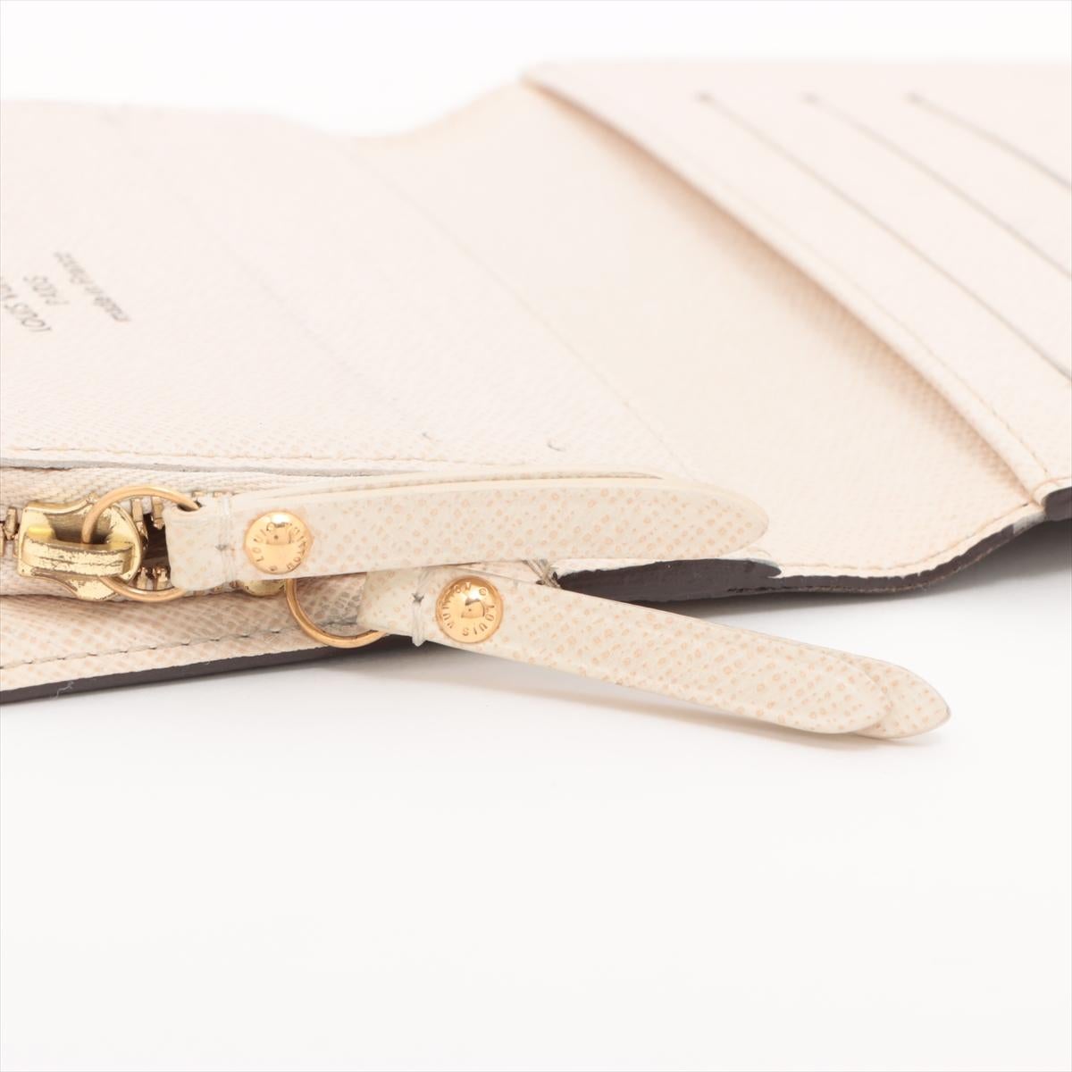 Monograma Louis Vuitton Billetera corta Bi-fold Insolite en venta 5
