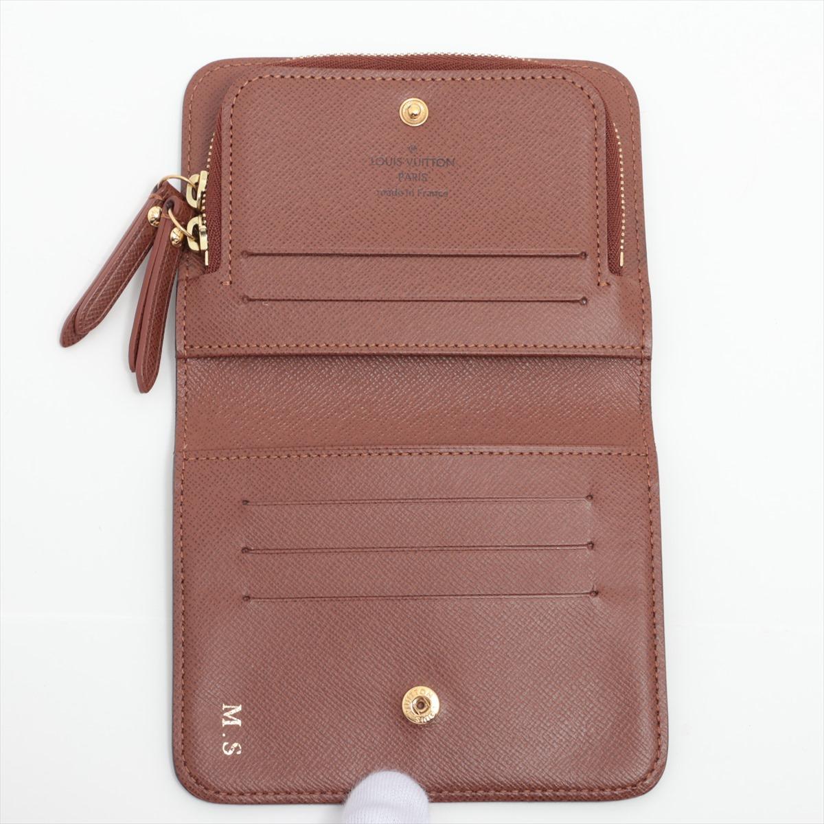 Women's Louis Vuitton Monogram Insolite Bi fold Short Wallet For Sale