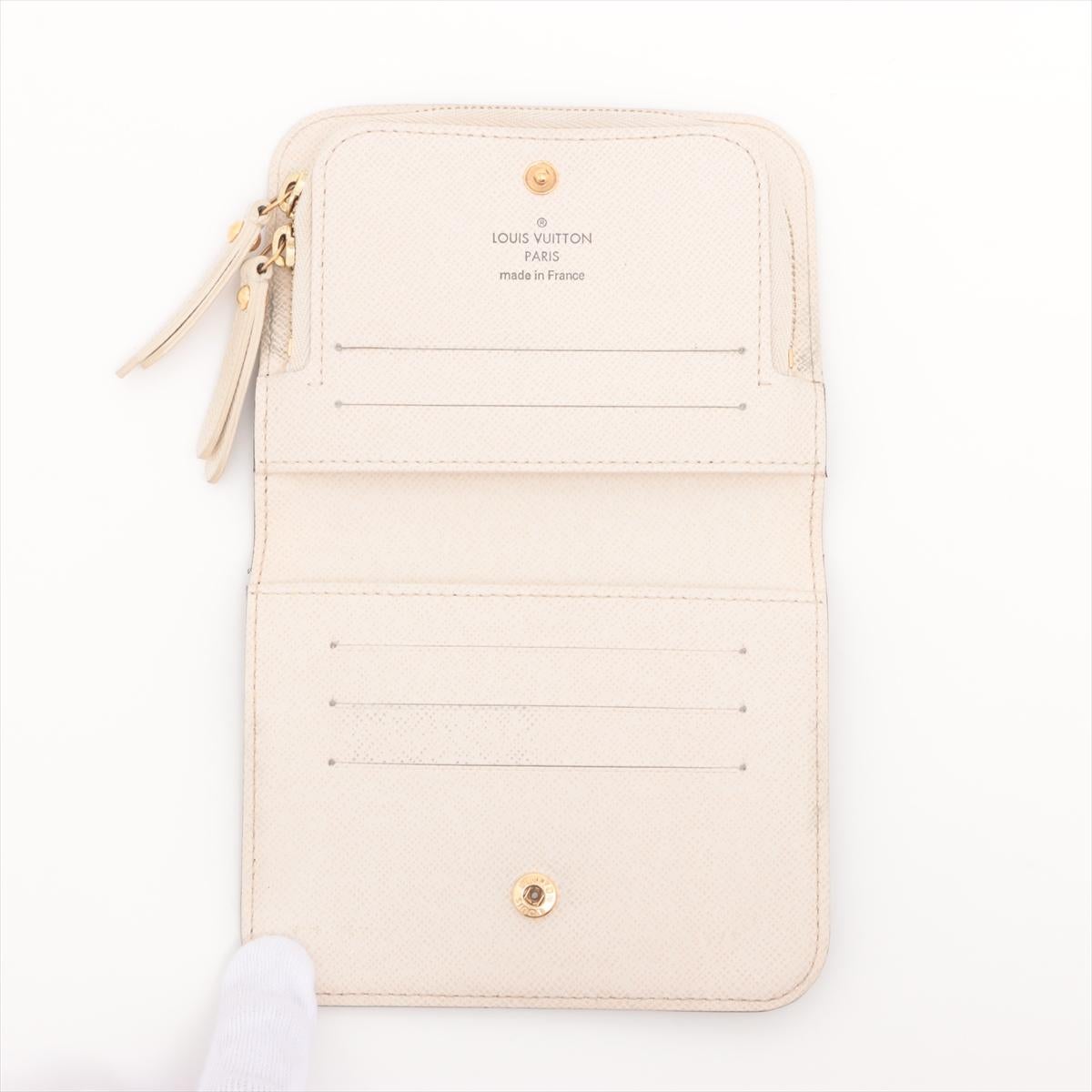 Monograma Louis Vuitton Billetera corta Bi-fold Insolite en Bueno estado para la venta en Humacao, PR