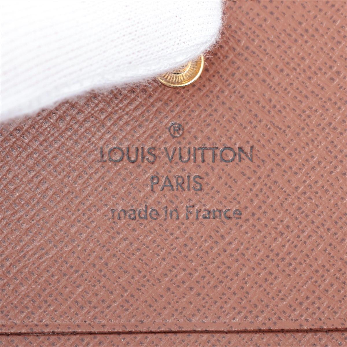 Louis Vuitton - Portefeuille court à deux rabats avec monogramme Insolite en vente 4