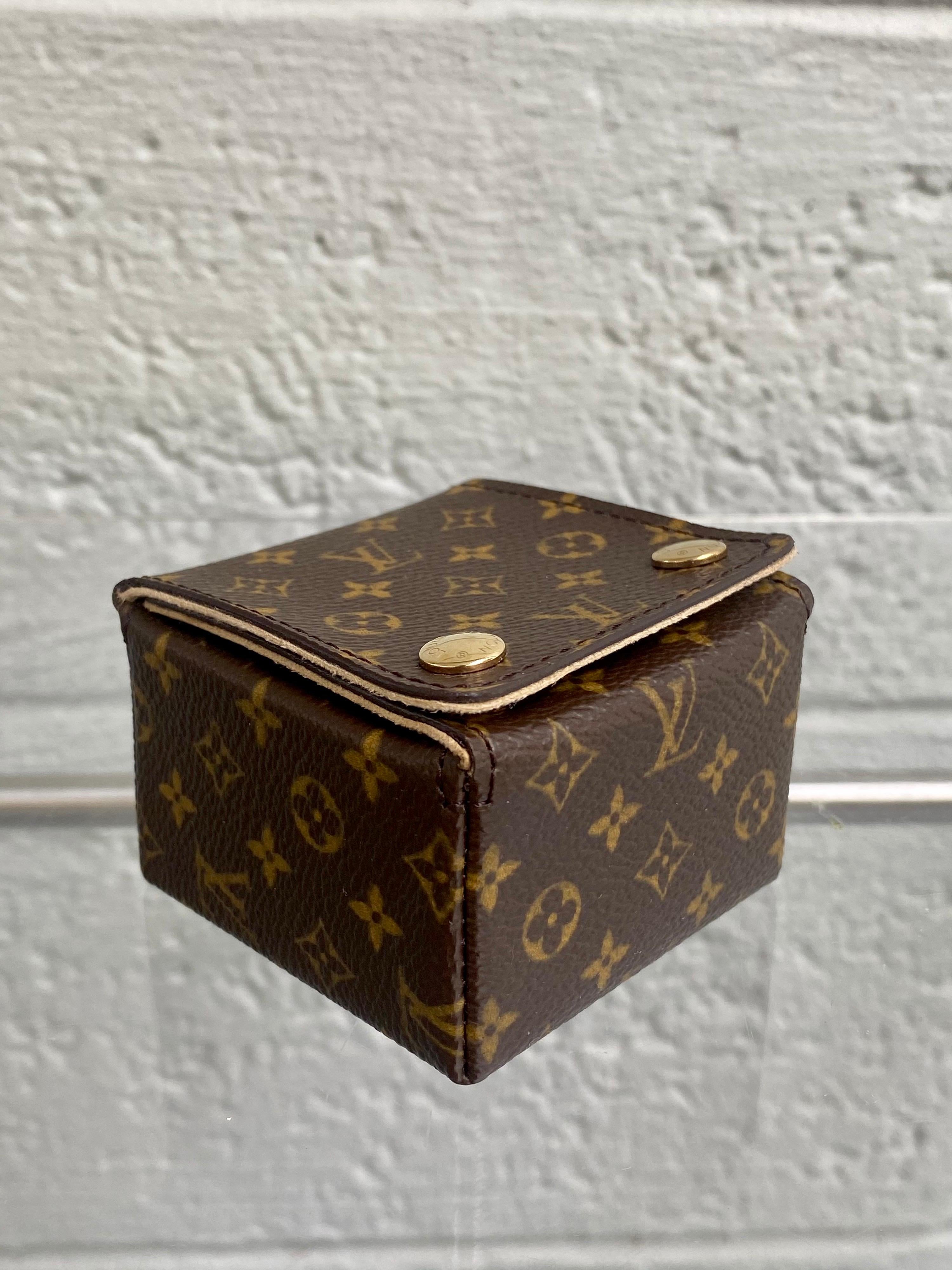 An exceptional case for romantic gifts. Classic Monogram designed for declarations of true love. Ideal for an engagement ring or other jewelry, this exquisite case proves that sometimes the container is as precious as what is inside.