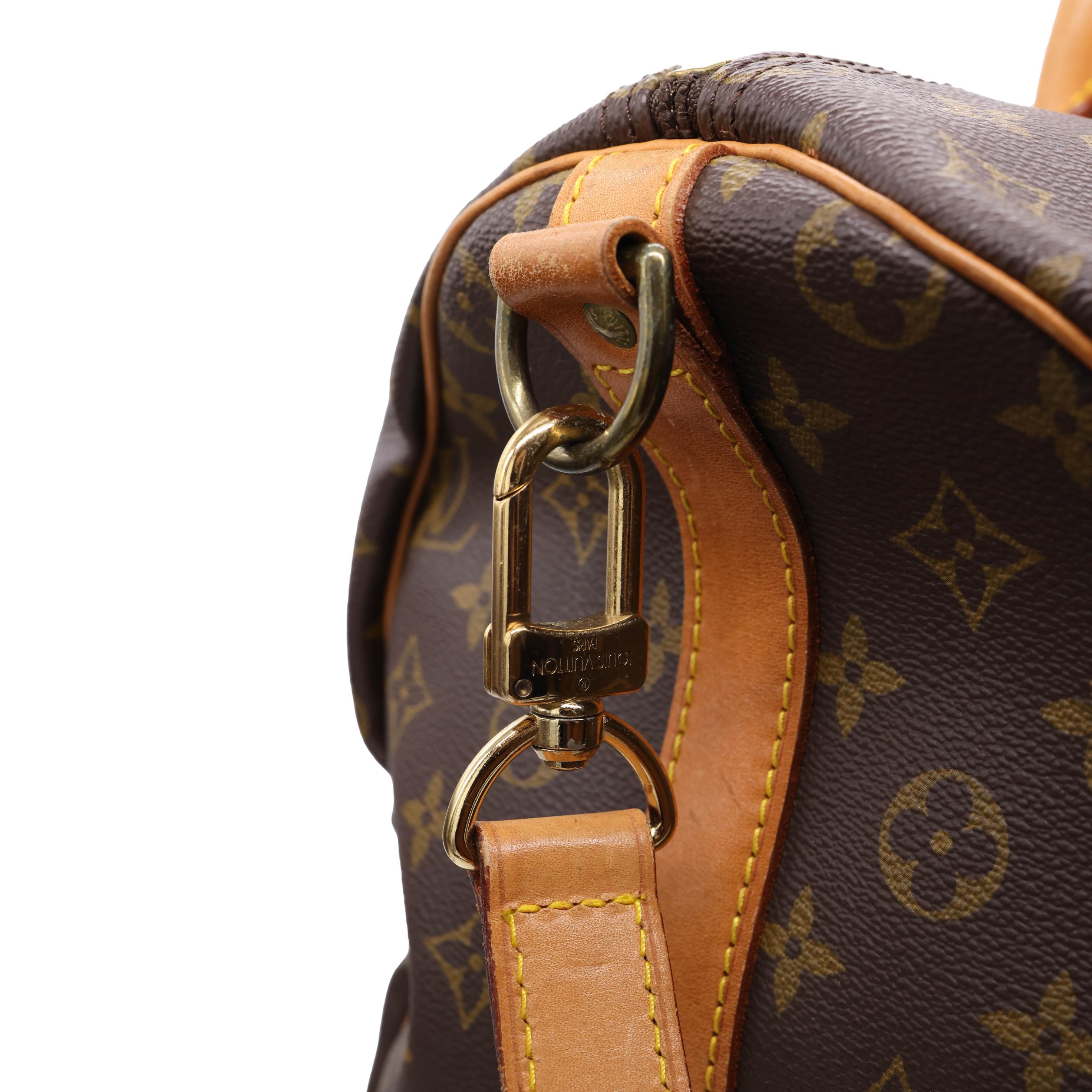 Women's or Men's Louis Vuitton Monogram Keepall 50 Bandouliere Duffle Bag, France 1984.