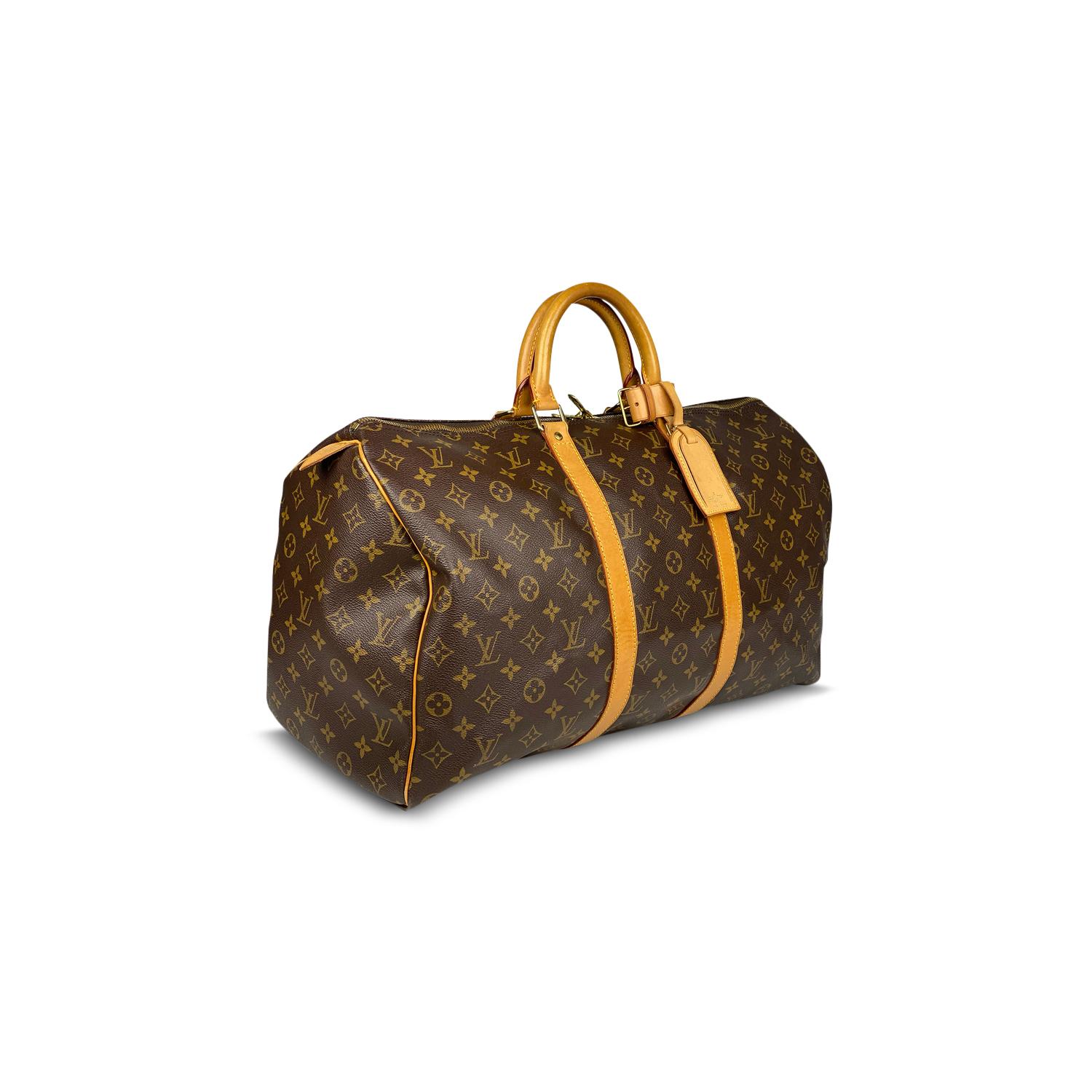 Brown and tan monogram coated canvas Louis Vuitton Keepall 50 with

– Brass hardware
– Tan vachetta leather trim
– Dual rolled top handles
– Tonal canvas lining and two-way zip closure at top

Overall Preloved Condition: Very Good

Exterior