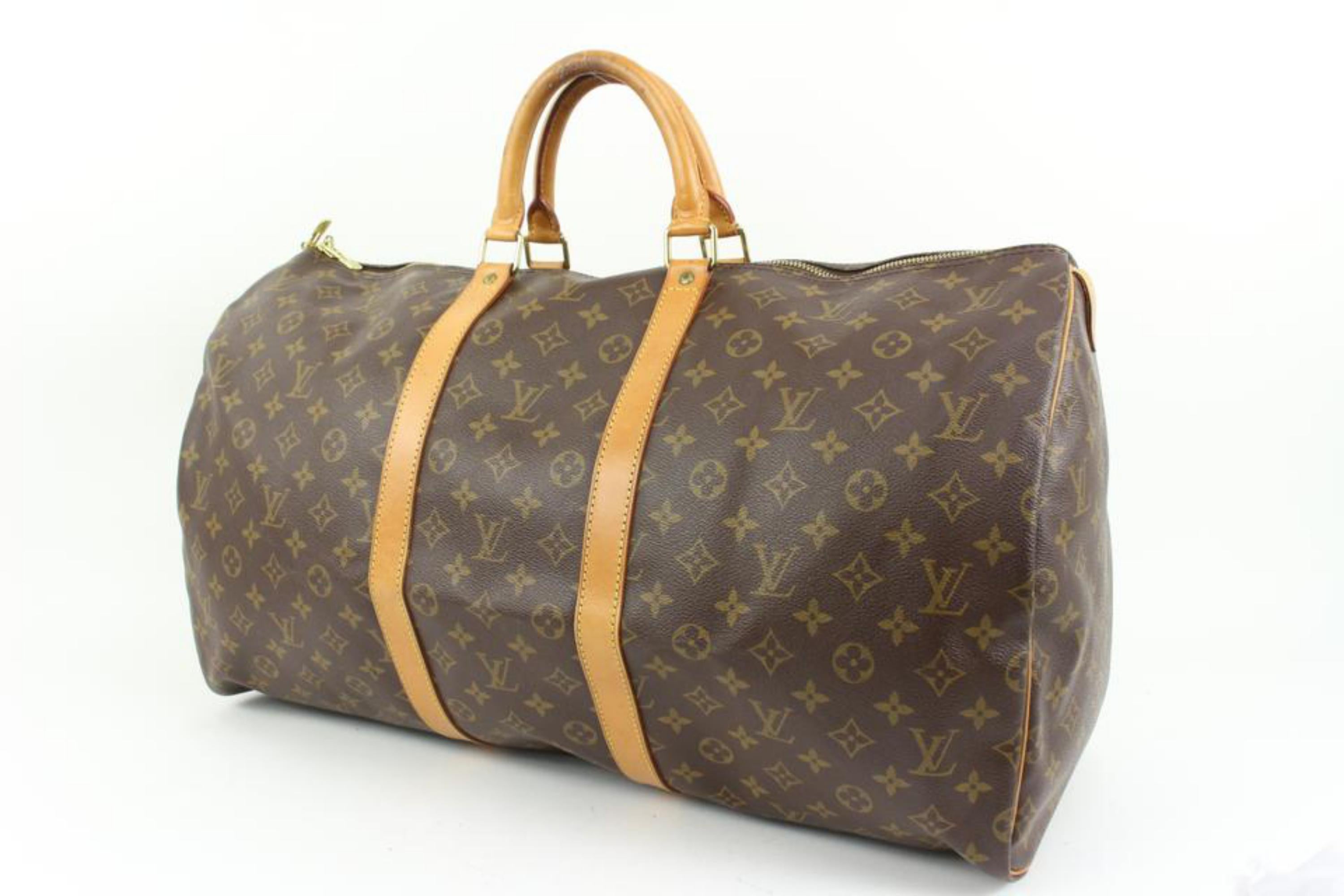Louis Vuitton Monogram Keepall 55 Boston Duffle Bag 18lz419s
Date Code/Serial Number: SP1914
Made In: France
Measurements: Length:  22