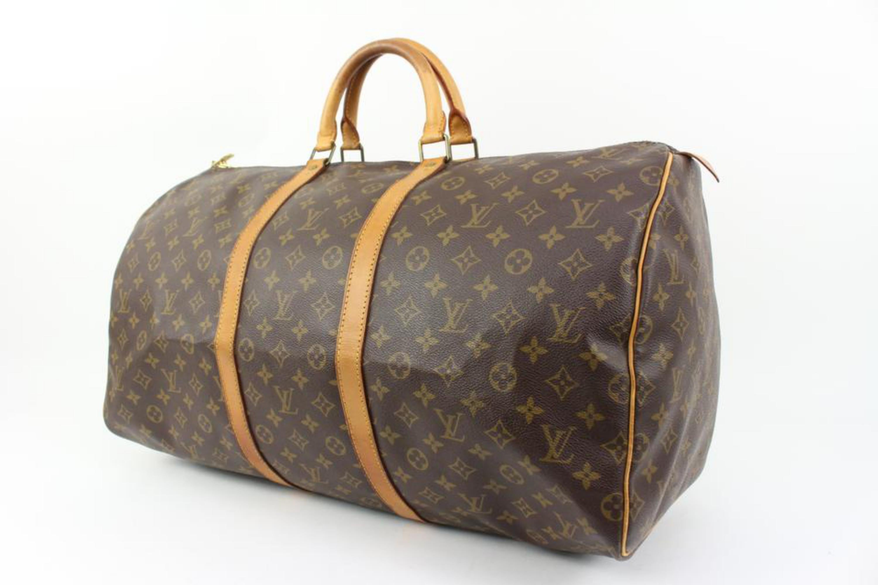 Louis Vuitton Monogram Keepall 55 Duffle Bag s331lk37
Date Code/Serial Number: MI0941
Made In: France
Measurements: Length:  22