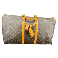 LOUIS VUITTON Monogram Keepall 55 Borsa Tote con Etichetta Bagaglio