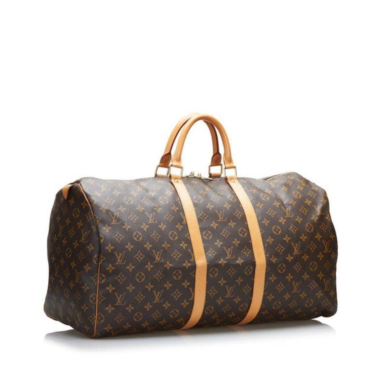 The very Chic Louis Vuitton Keepall 45 Travel bag in Cognac epi leather,  GHW at 1stDibs
