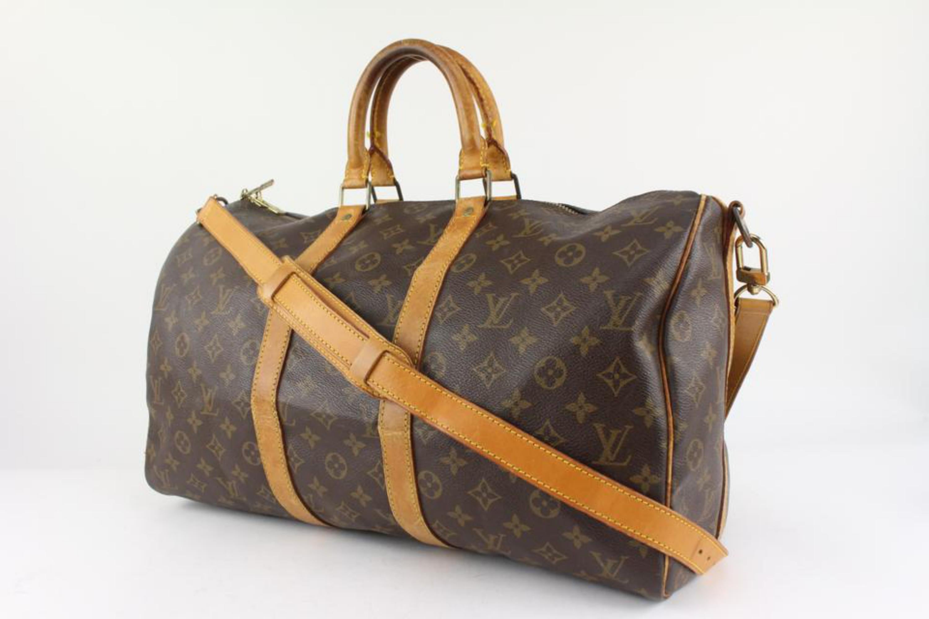 Louis Vuitton Monogram Keepall Bandouliere 45 Duffle Bag with Strap 1122lv11
Date Code/Serial Number: VI0930
Made In: France
Measurements: Length:  18