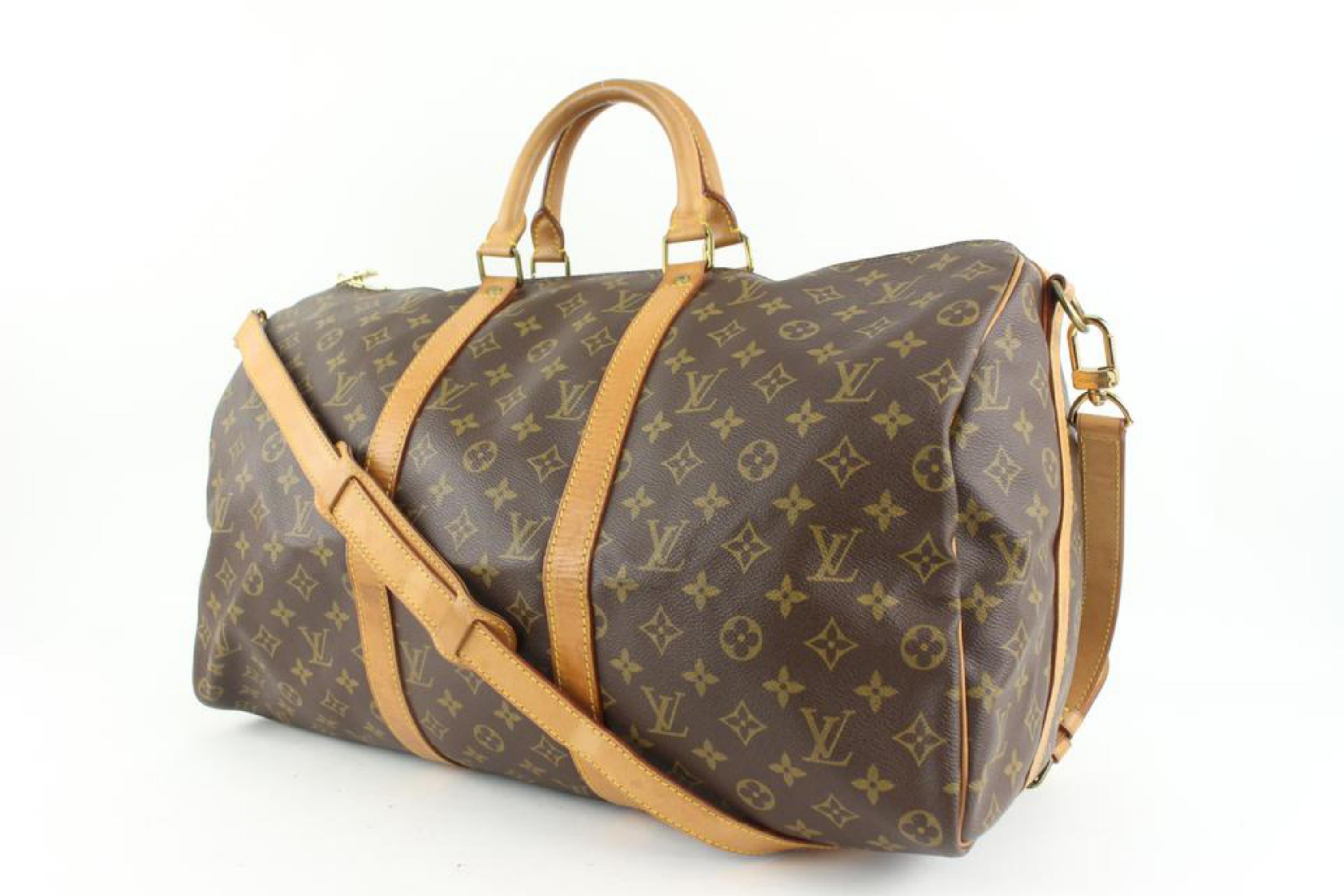 Louis Vuitton Monogram Keepall Bandouliere 50 Duffle Bag with Strap 110lv53
Date Code/Serial Number: VI8912 
Made In: France
Measurements: Length:  19.5