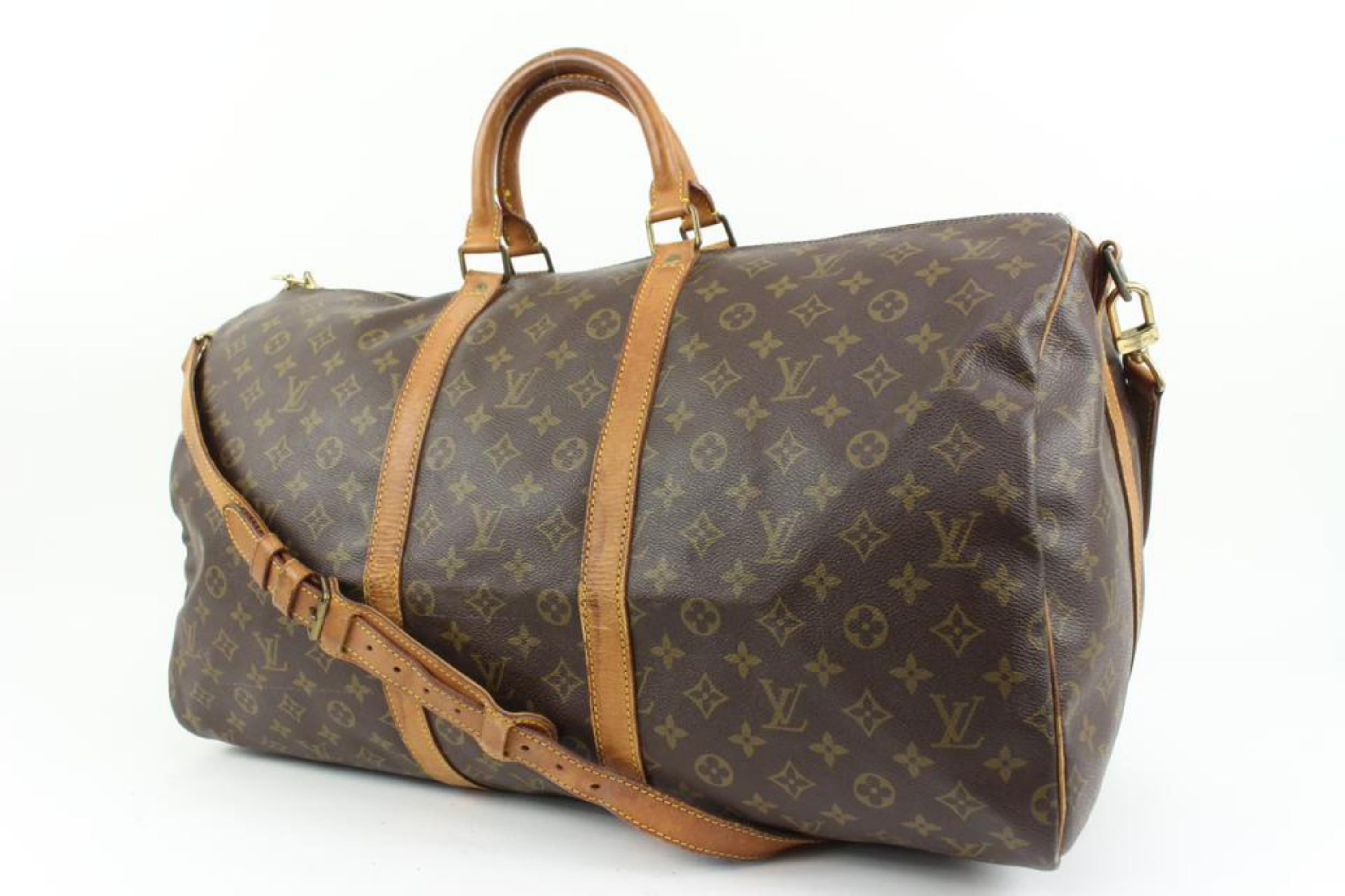 Louis Vuitton Monogram Keepall Bandouliere 55 Boston Duffle Bag with Strap 40lk420s
Date Code/Serial Number: VI8904
Made In: France
Measurements: Length:  22