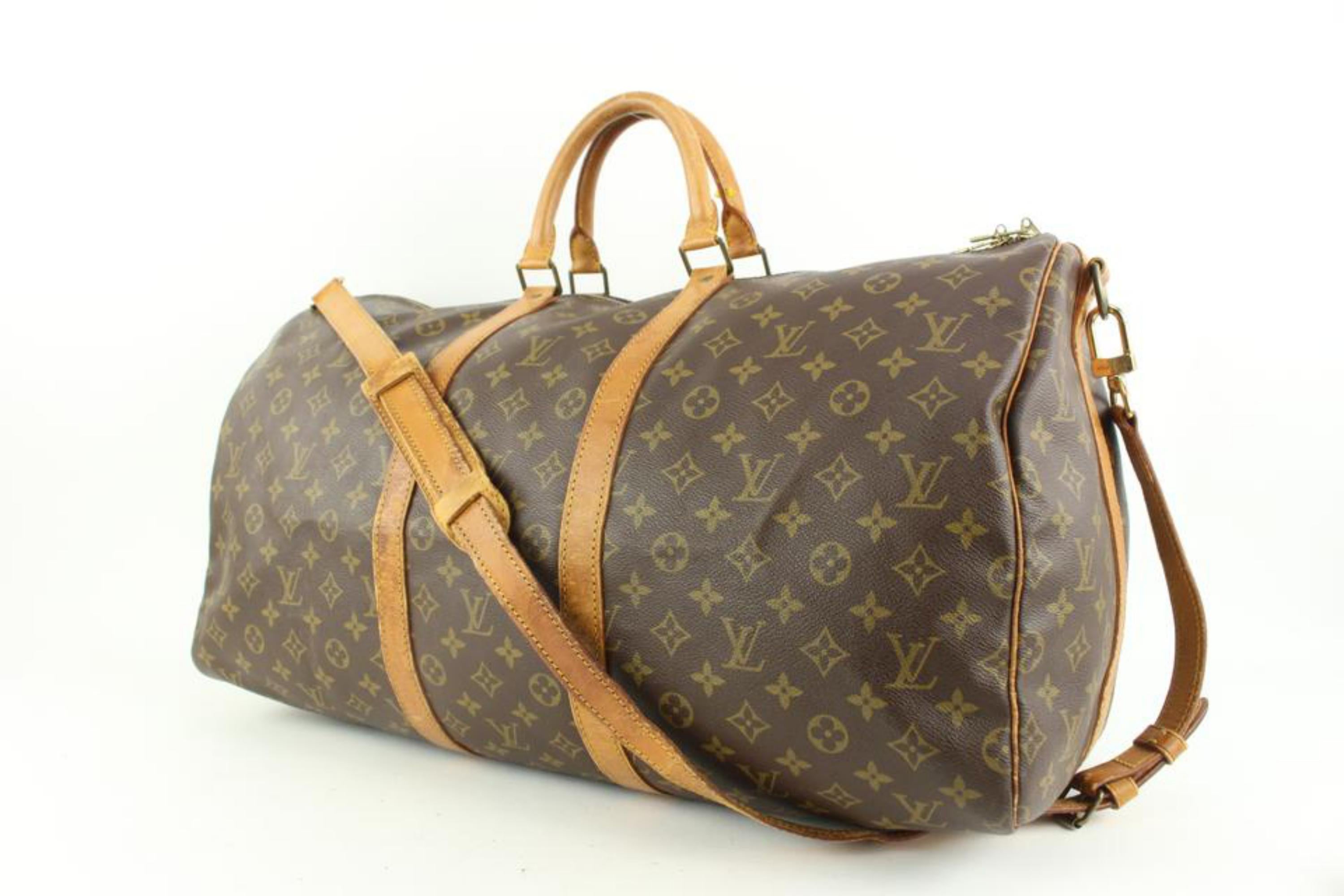 Louis Vuitton Monogram Keepall Bandouliere 55 Duffle Bag with Strap16lv44
Date Code/Serial Number:  VI8910
Made In: France
Measurements: Length:  22