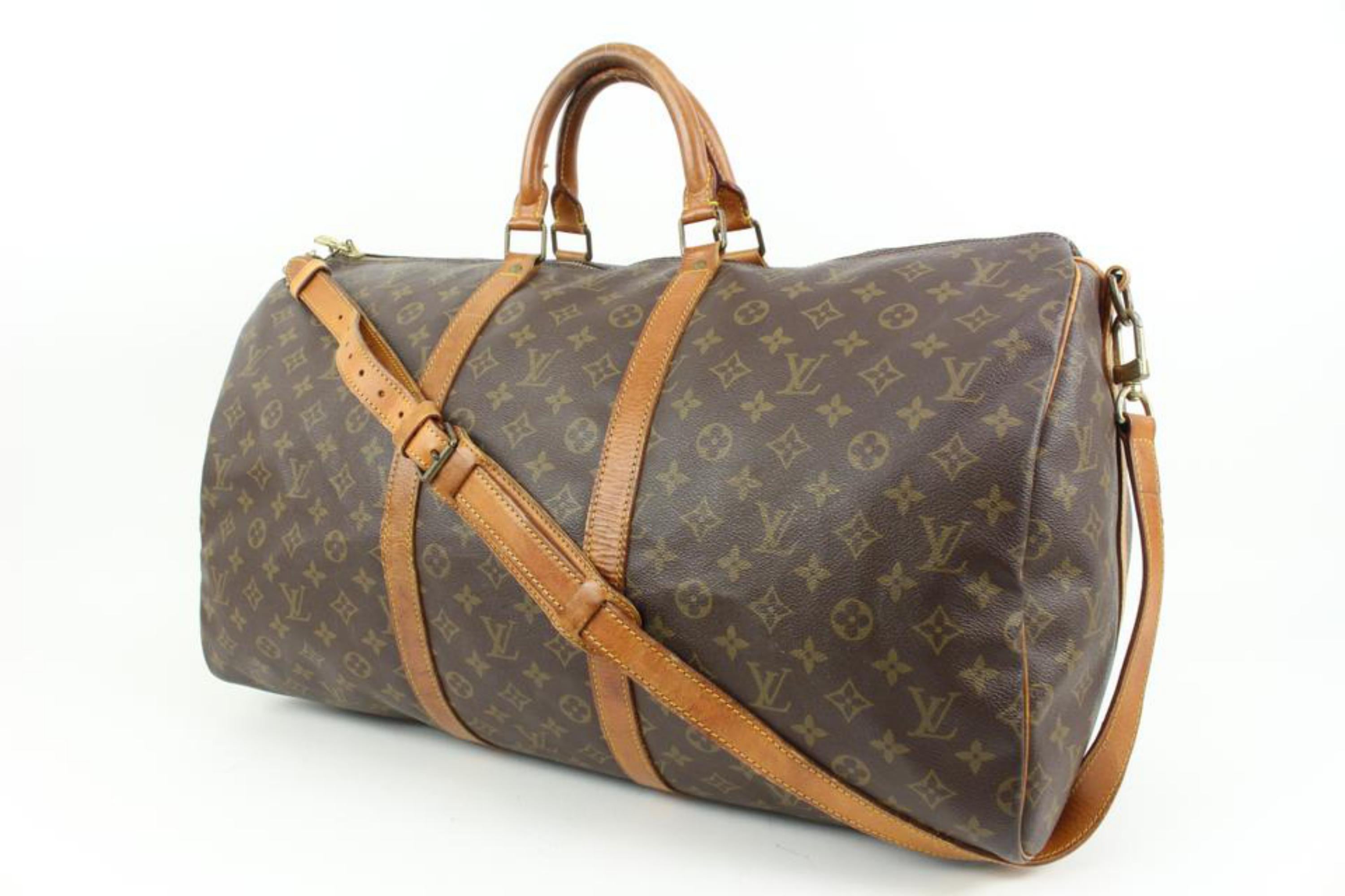 Louis Vuitton Monogram Keepall Bandouliere 55 Duffle Bag with Strap 43lz413s
Date Code/Serial Number: VI883
Made In: France
Measurements: Length:  21.5